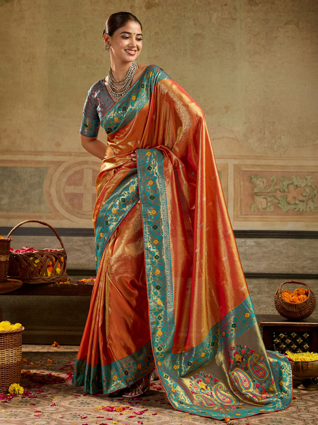 Fascinating Orange Zari Woven Tissue Silk Wedding Wear Saree