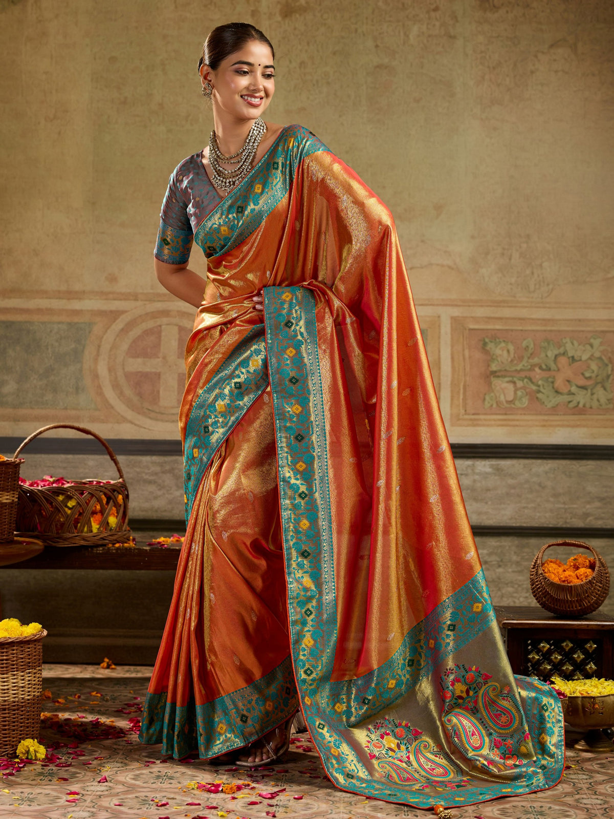 Fascinating Orange Zari Woven Tissue Silk Wedding Wear Saree