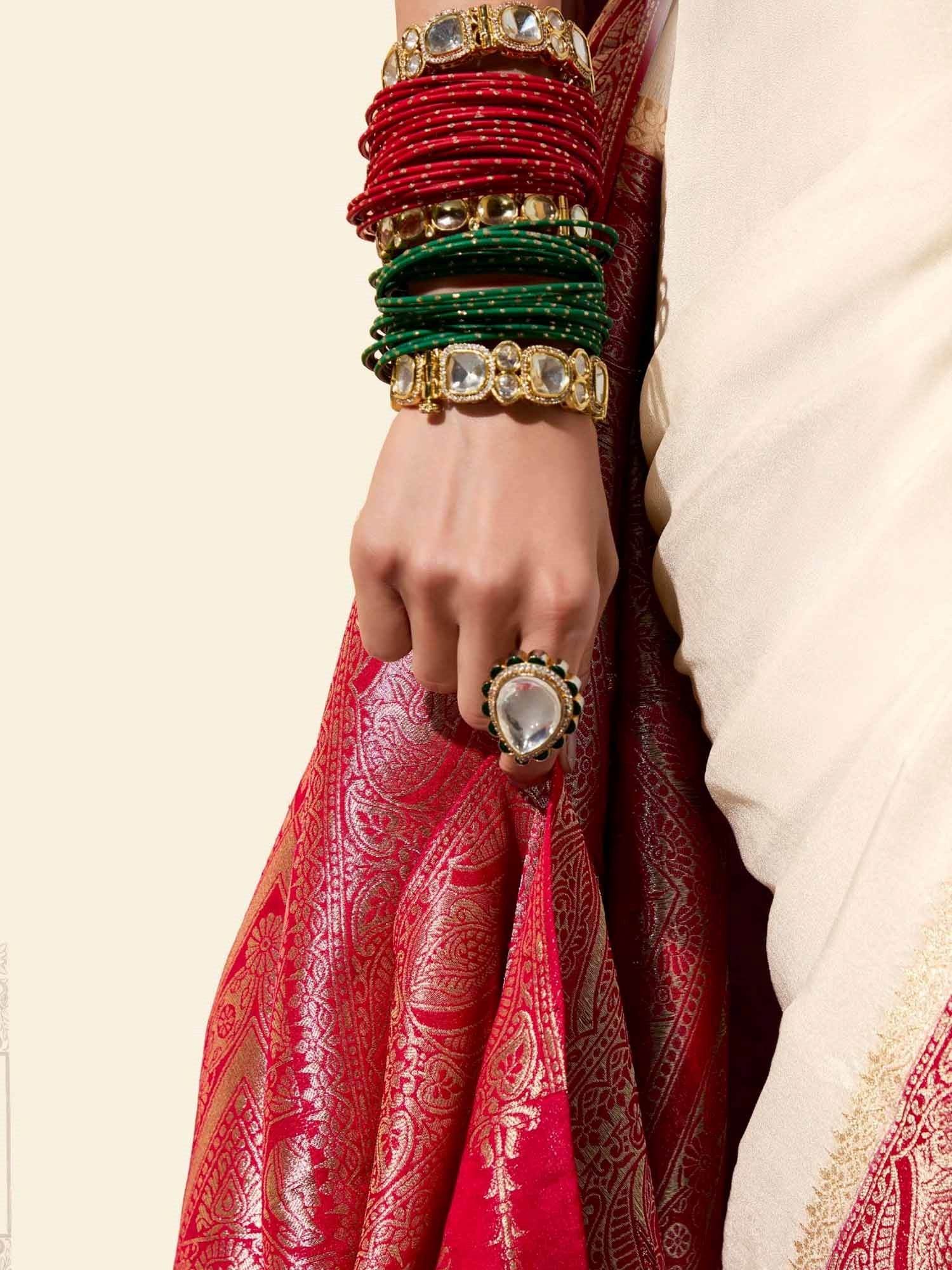 Charming Off-White Zari Weaving Georgette Festive Wear Saree With Blouse