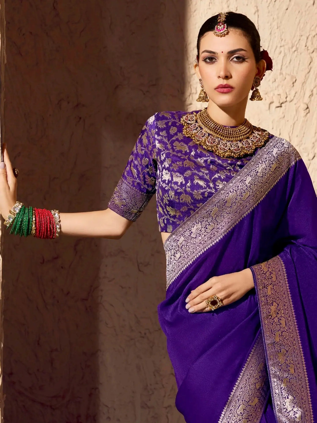 Lovable Purple Zari Weaving Work Georgette Wedding Wear Saree With Blouse