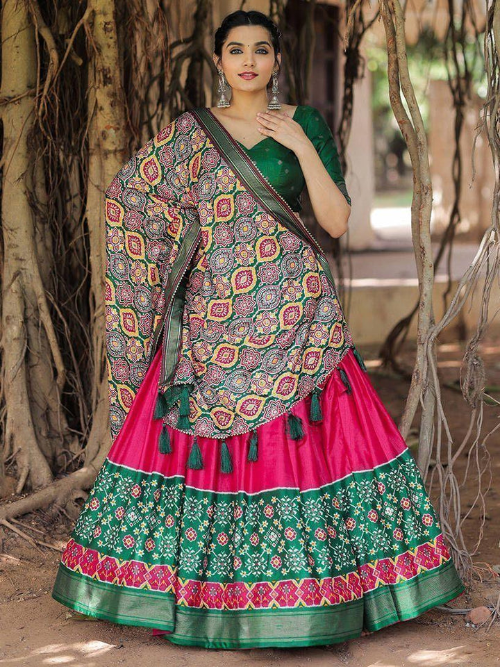 Fabulous Pink Green Patola Printed Silk Garba Wear Lehenga Choli
