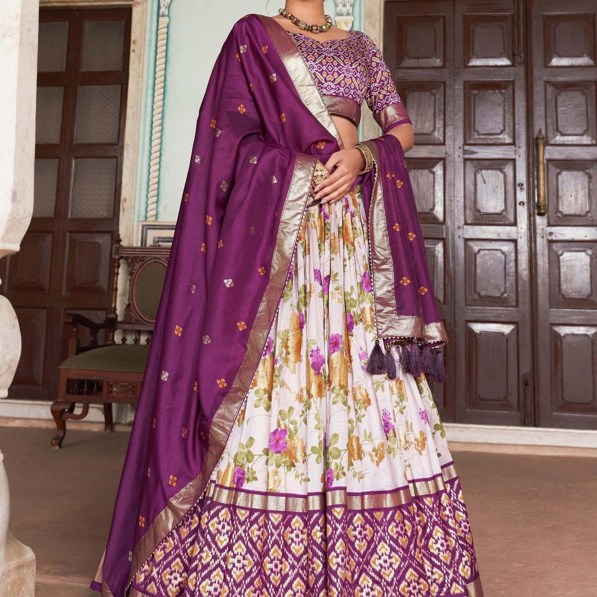 Captivating White & Wine Patola Printed Tussar Silk Lehenga Choli