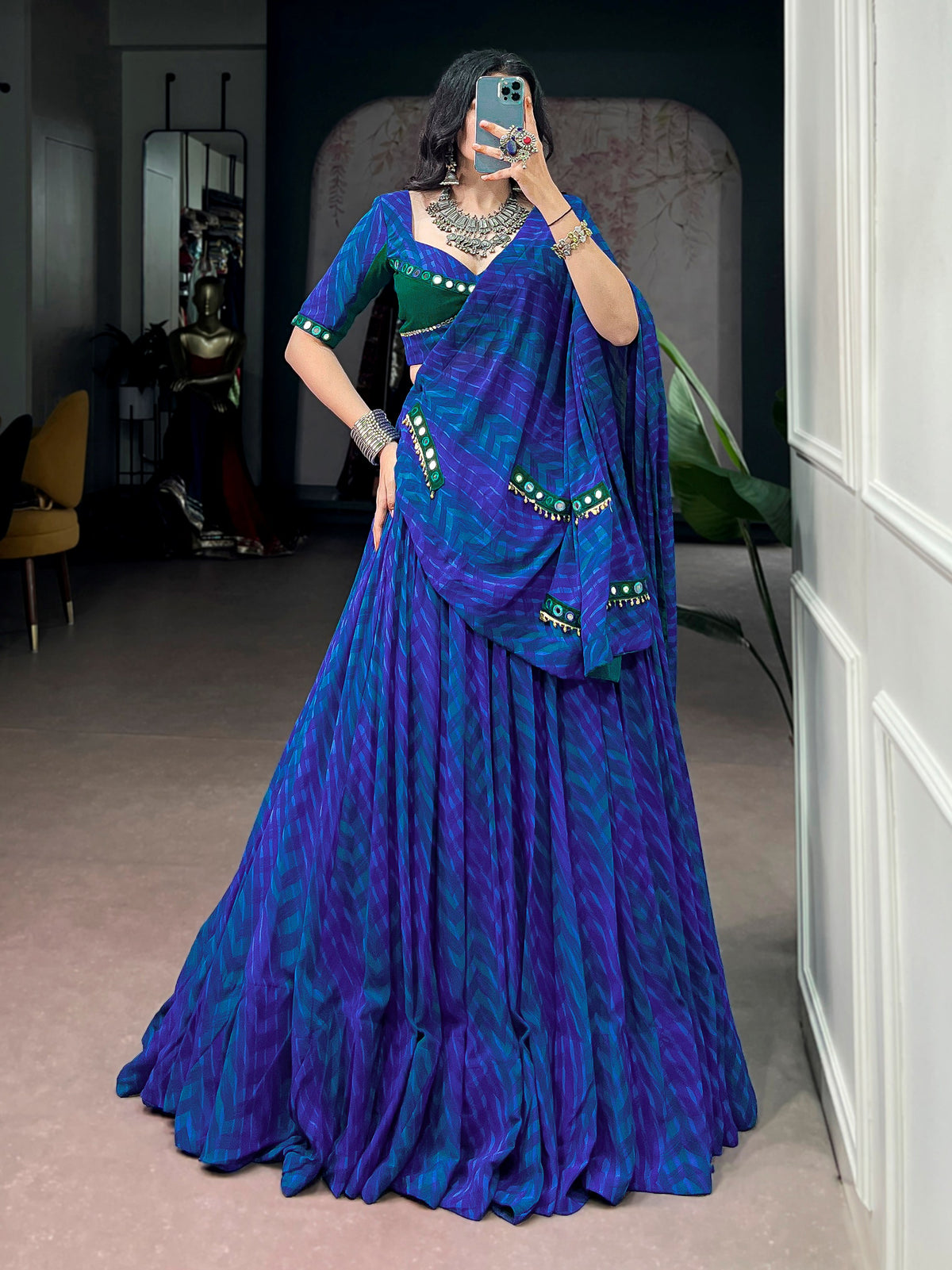 Glowing Navy Blue Mirror Work Georgette Navratri Wear Lehenga Choli
