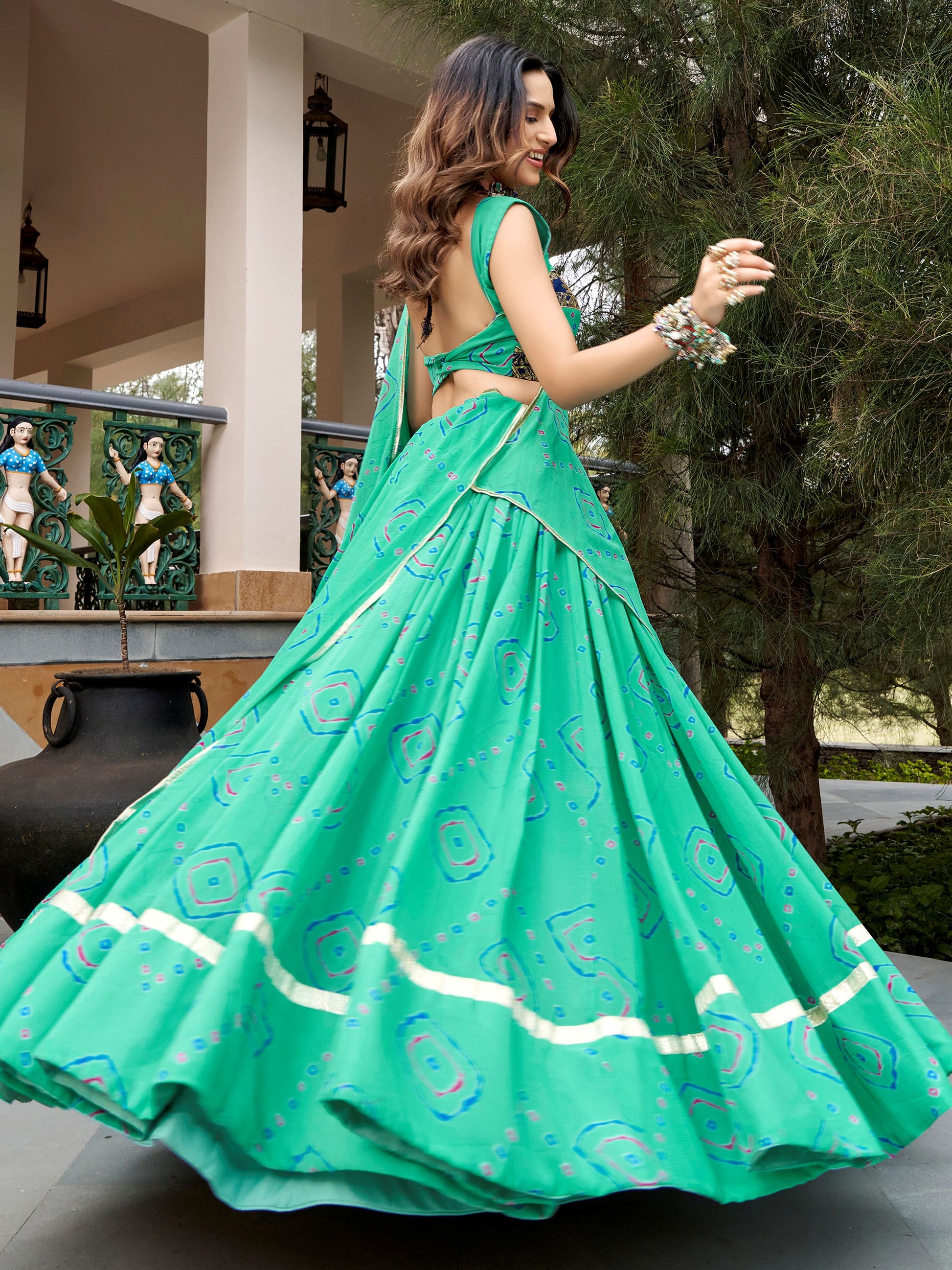 Vibrant Aqua Green Bandhej Print Georgette Navratri Wear Lehenga Choli