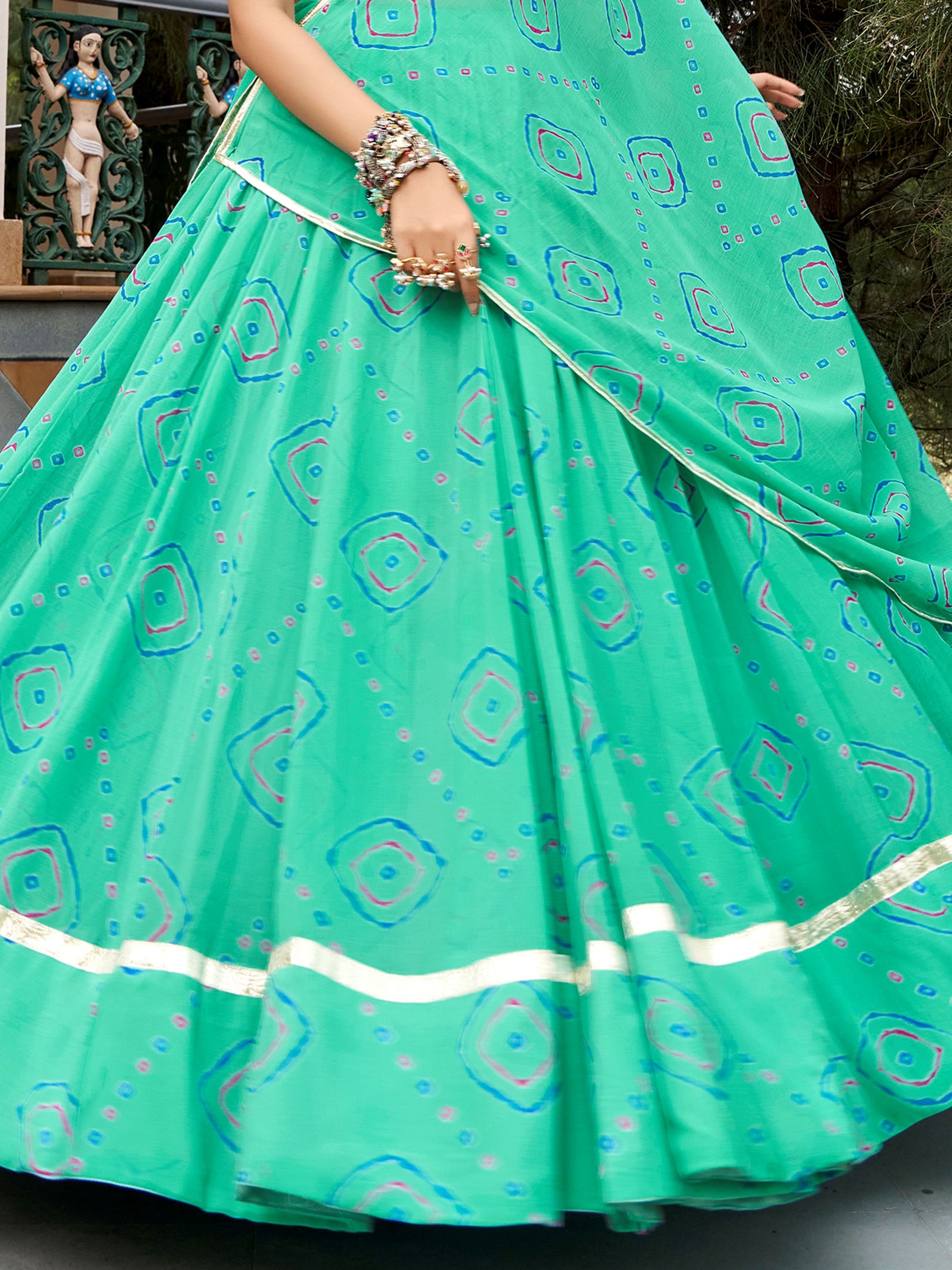 Vibrant Aqua Green Bandhej Print Georgette Navratri Wear Lehenga Choli