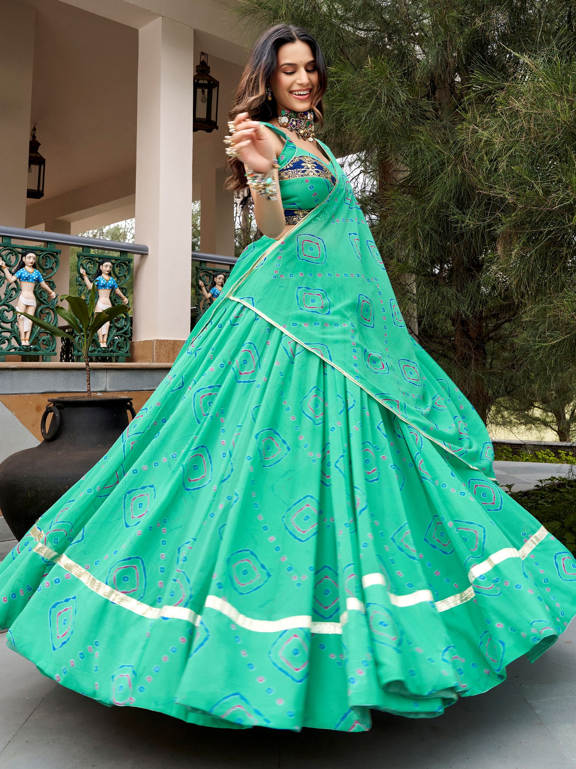 Vibrant Aqua Green Bandhej Print Georgette Navratri Wear Lehenga Choli