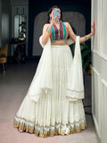 Artistic Off White Mirror Work Georgette Navratri Wear Lehenga Choli