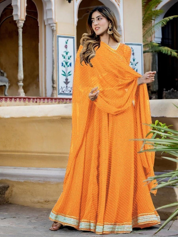 Enchanting Orange Laheriya Print Georgette Designer Lehenga Choli