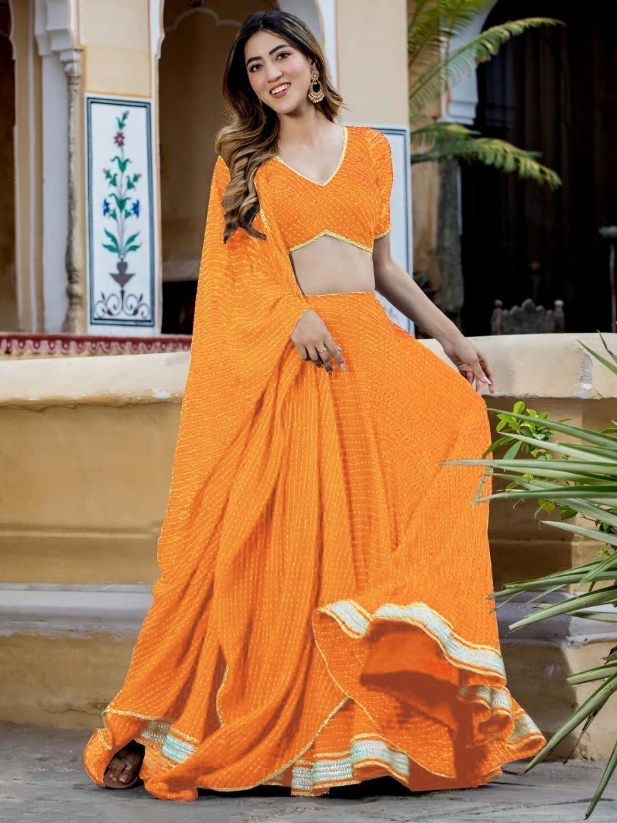 Enchanting Orange Laheriya Print Georgette Designer Lehenga Choli