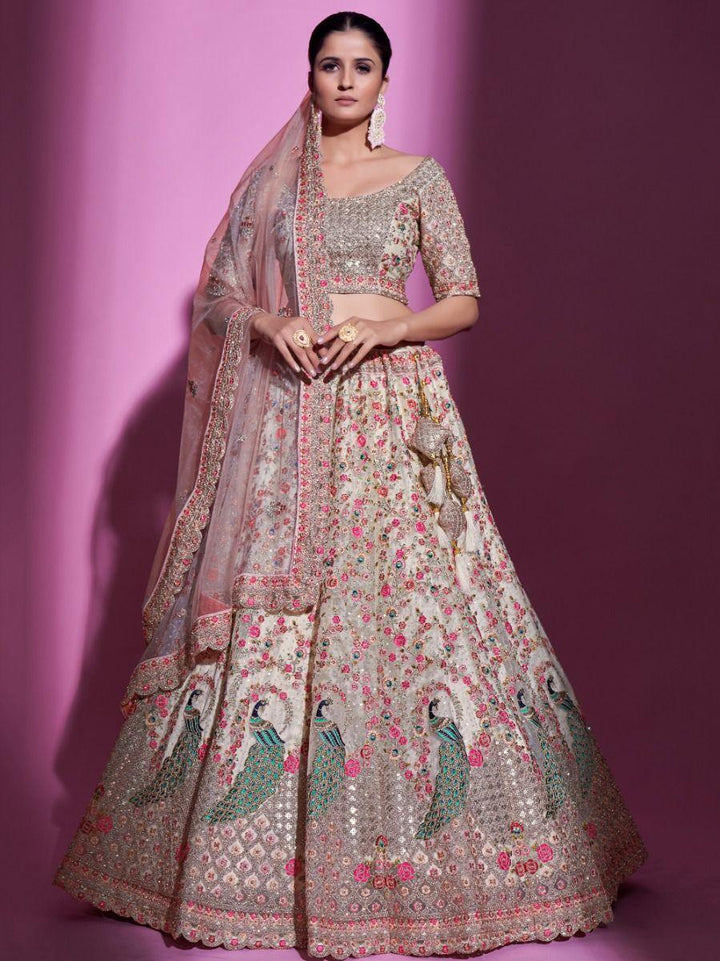 Magnificent Cream Sequins Soft Net Wedding Wear Lehenga Choli