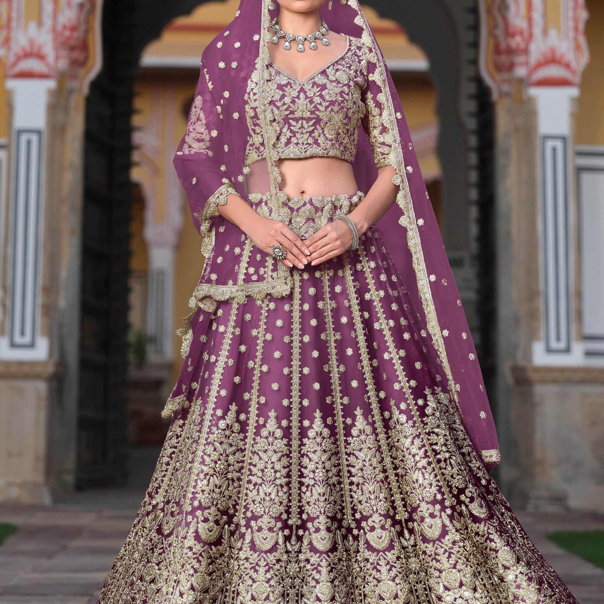 Astounding Purple Zari Embroidery Net Reception Wear Lehenga With Blouse