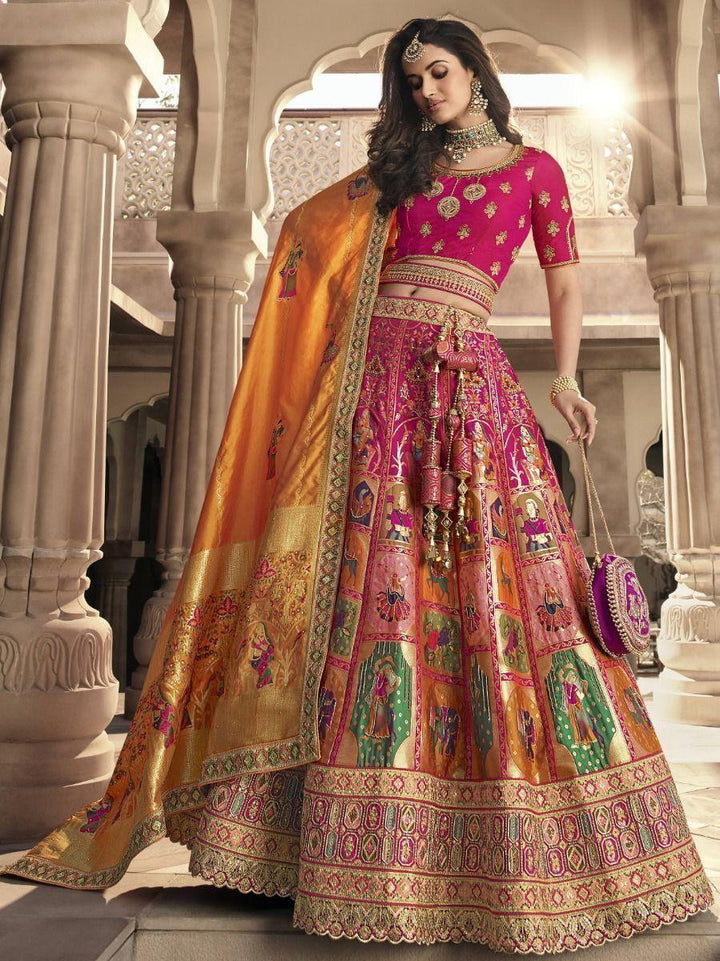 Wonderful Orange-Rani Embroidered Banarasi Silk Wedding Lehenga Choli