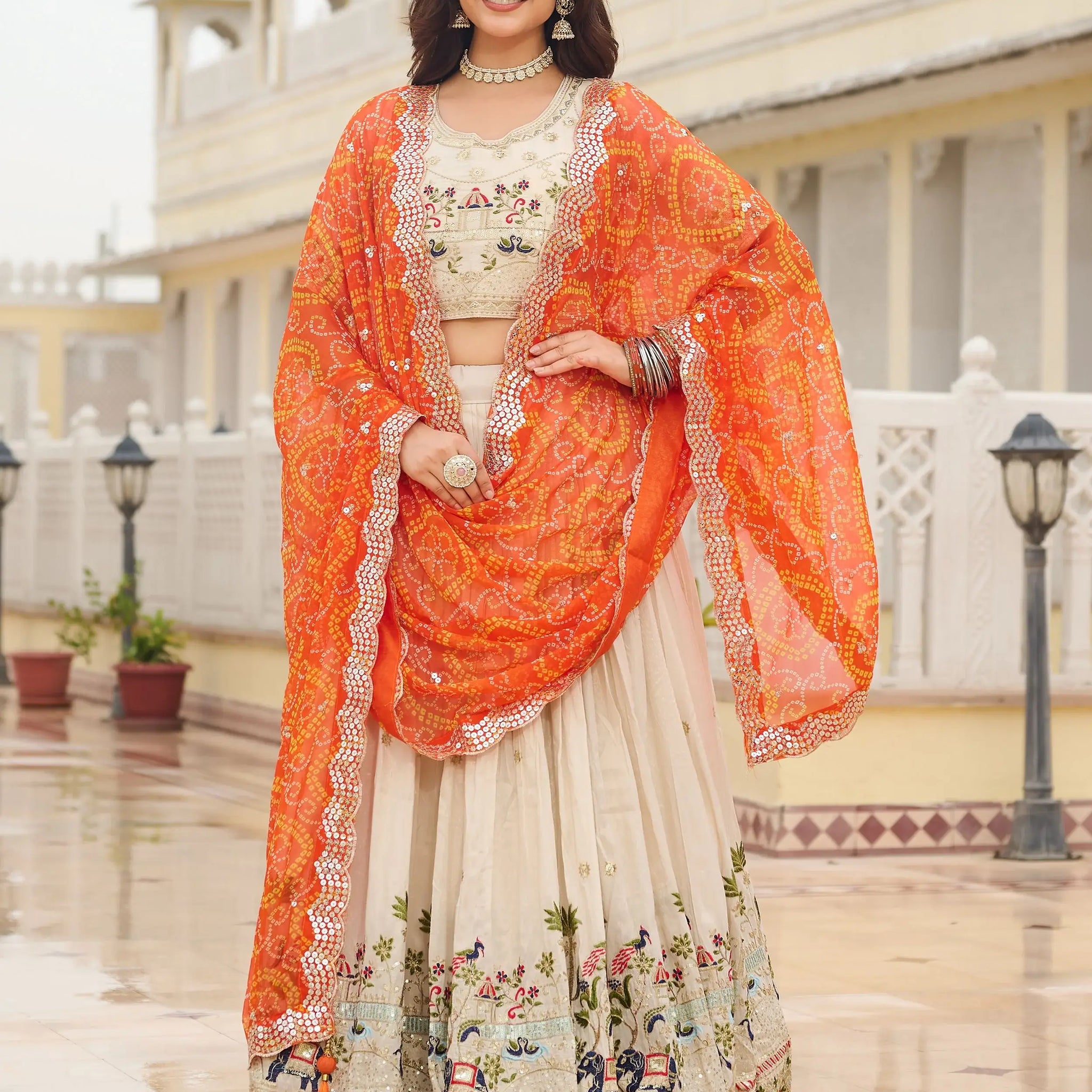Beautiful Off-White Sequins Tissue Lehenga Choli With Orange Dupatta