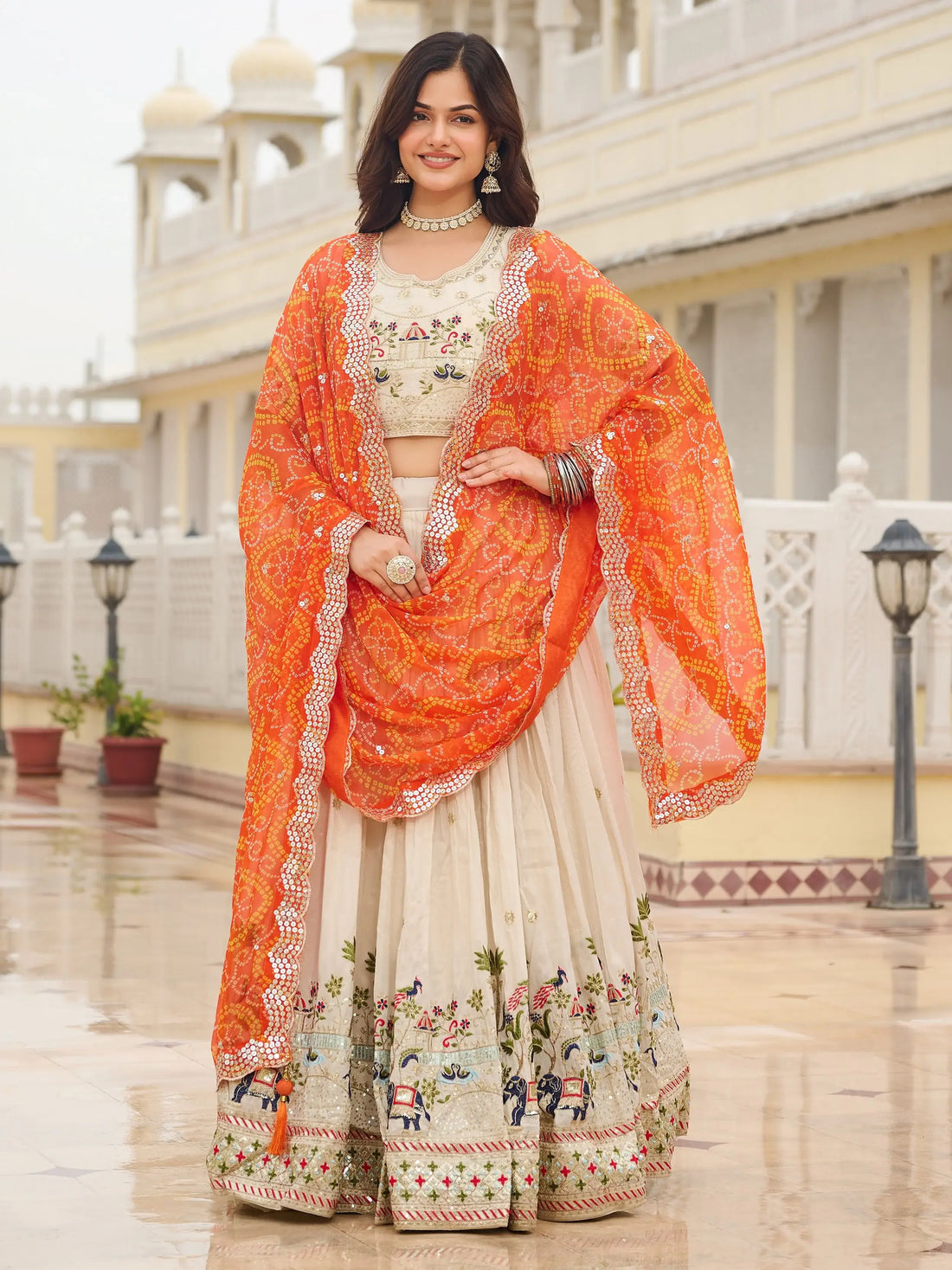 Beautiful Off-White Sequins Tissue Lehenga Choli With Orange Dupatta