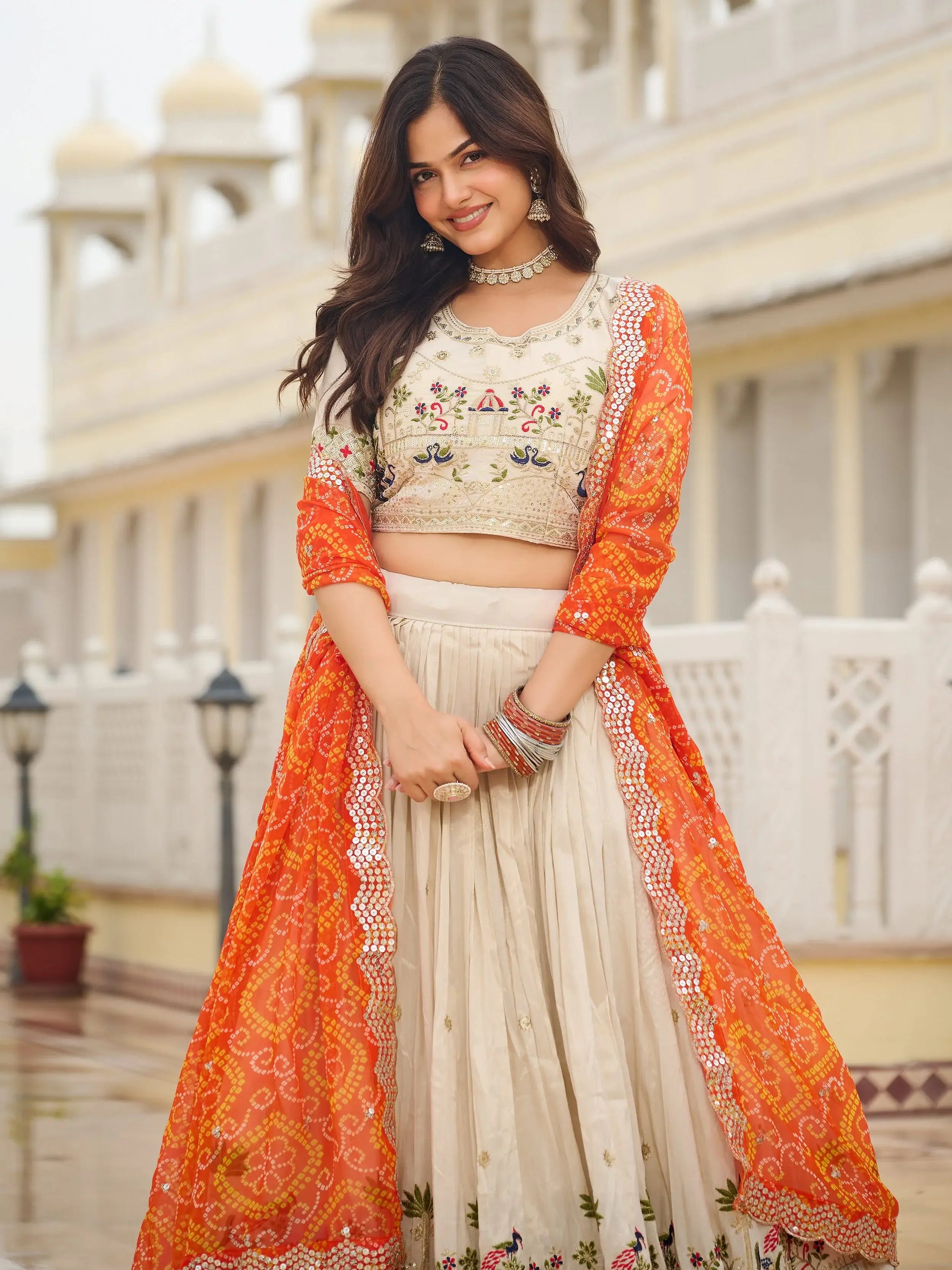 Beautiful Off-White Sequins Tissue Lehenga Choli With Orange Dupatta