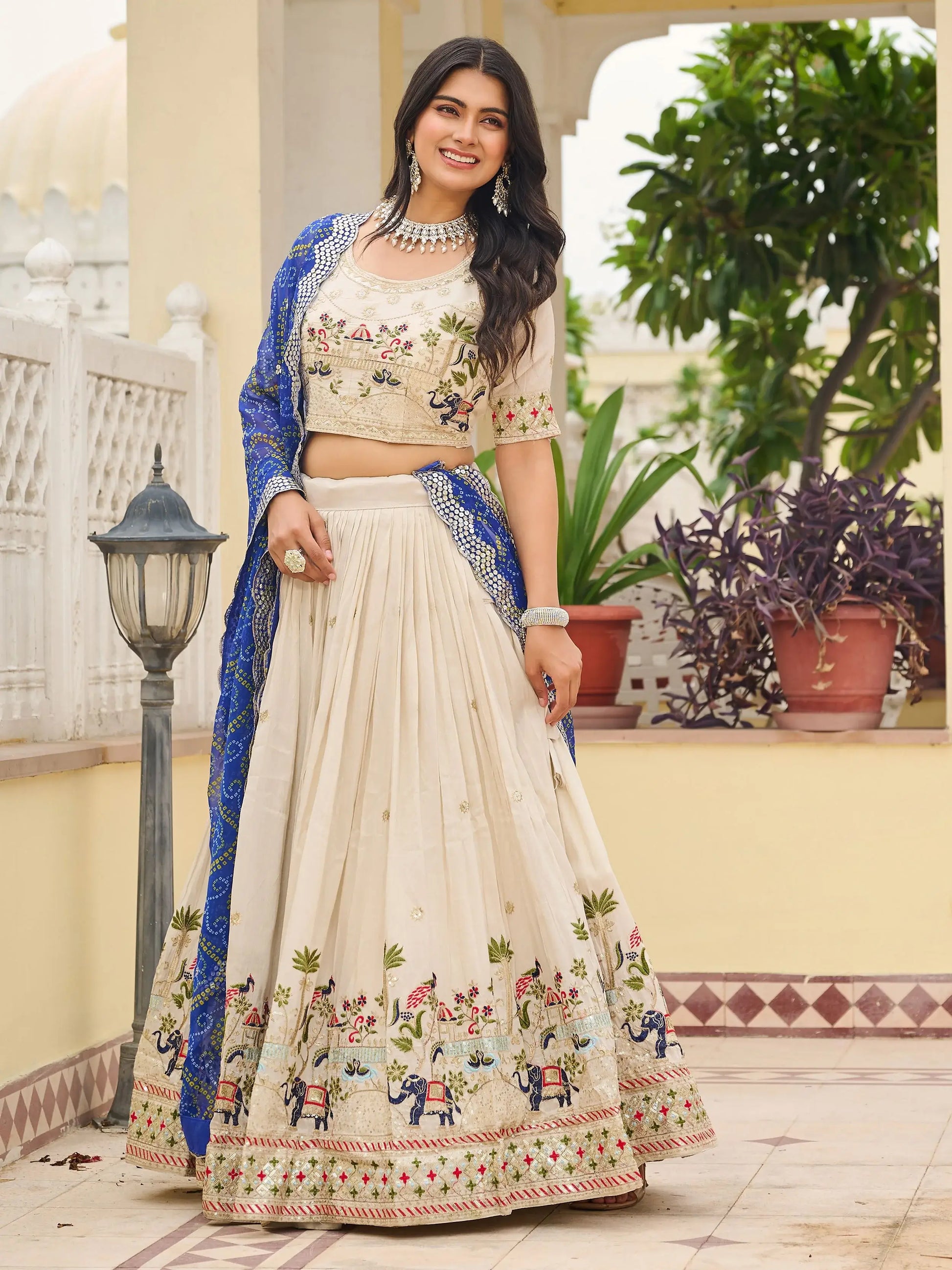 Attractive Off-White Thread Work Tissue Event Wear Lehenga Choli With Blue Dupatta