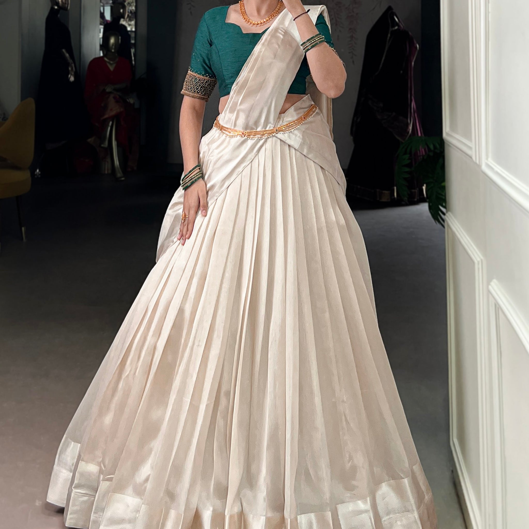 Beautiful White Border Work Silk Onam Special Half Saree Lehenga With Green Blouse