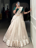 Beautiful White Border Work Silk Onam Special Half Saree Lehenga With Green Blouse
