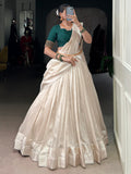 Beautiful White Border Work Silk Onam Special Half Saree Lehenga With Green Blouse