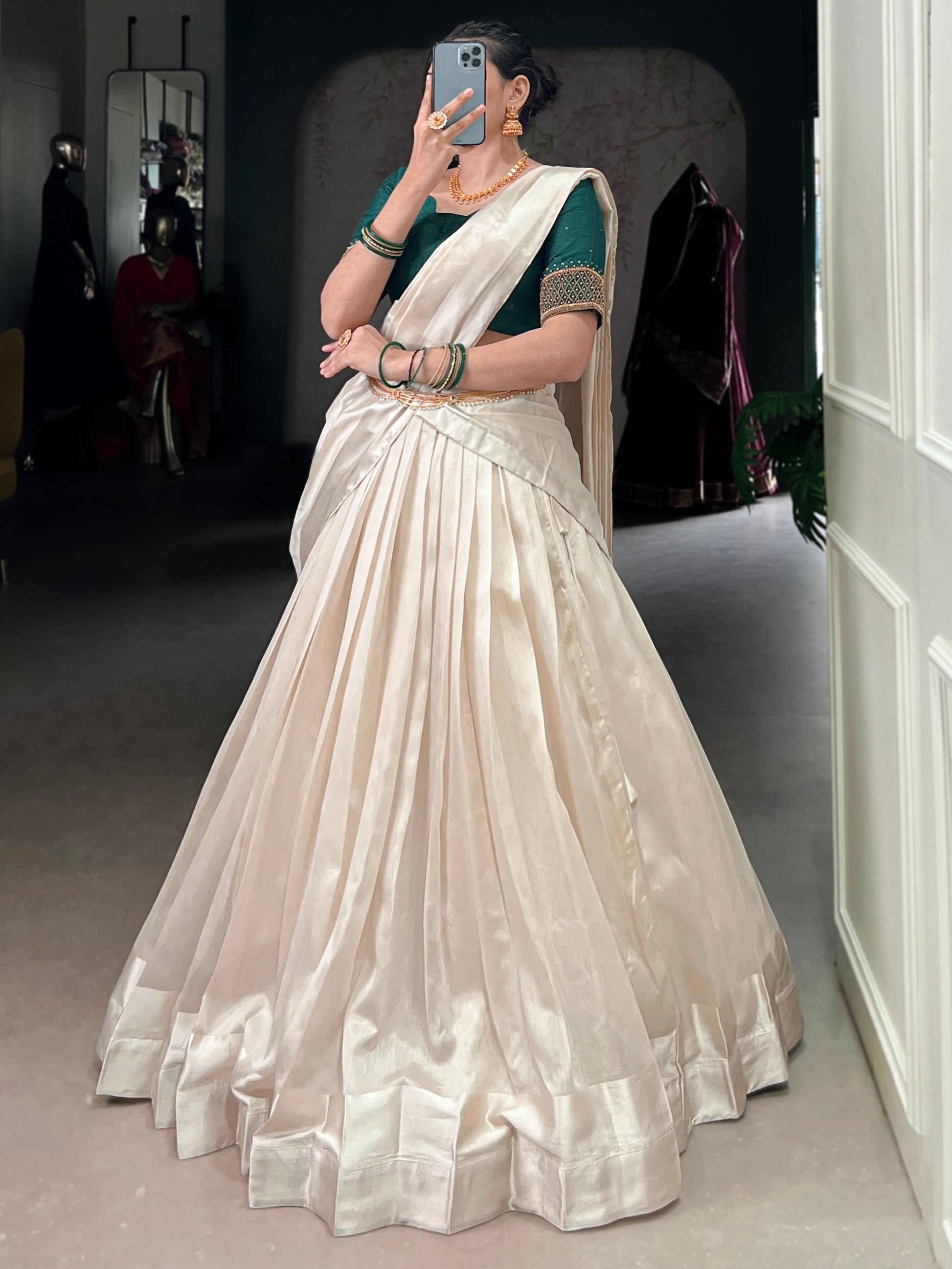 Beautiful White Border Work Silk Onam Special Half Saree Lehenga With Green Blouse