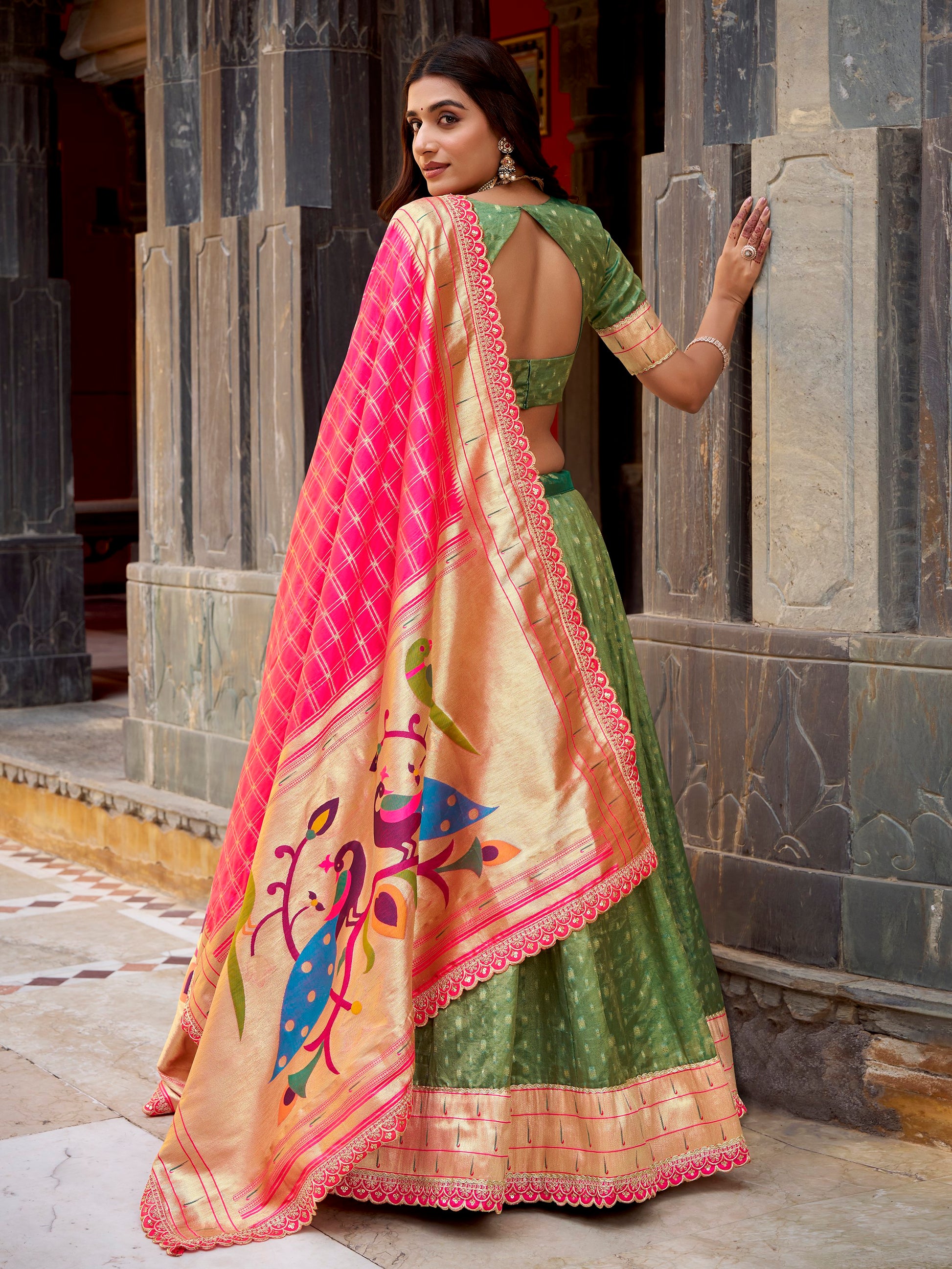 Bewitching Green Zari Weaving Silk Mehendi Wear Lehenga With Blouse