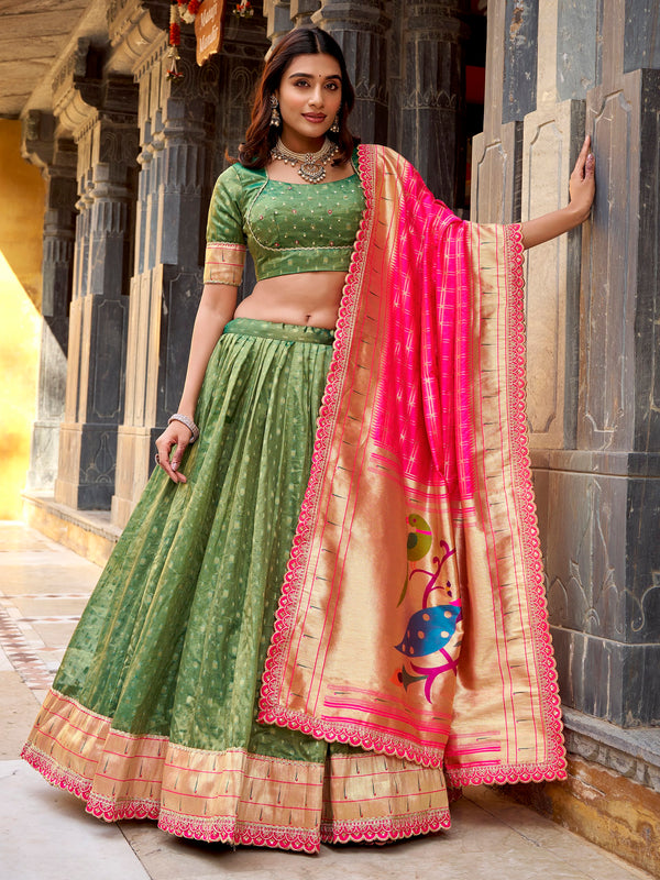 Bewitching Green Zari Weaving Silk Mehendi Wear Lehenga With Blouse