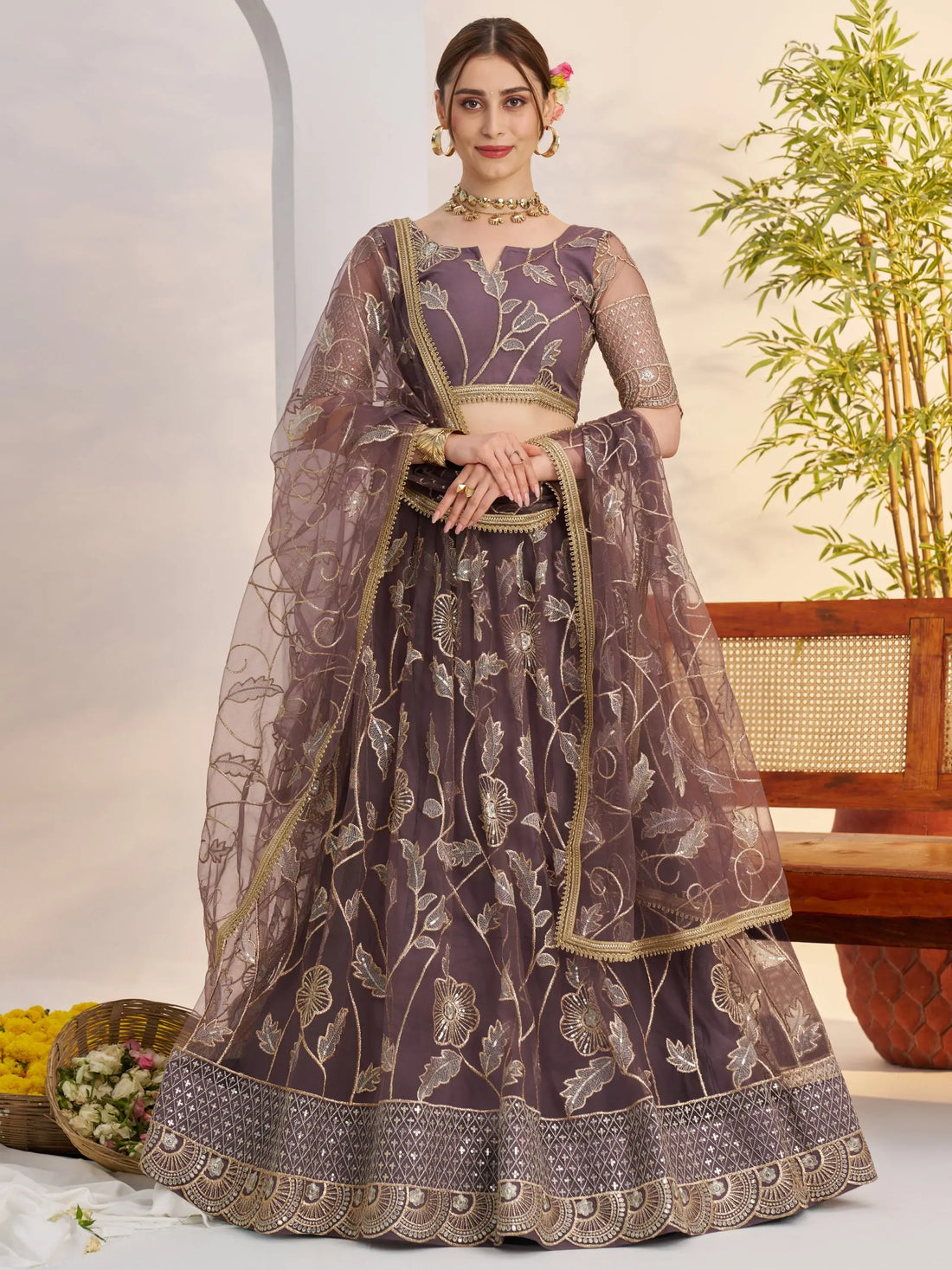 Attractive Mauve Thread Embroidery Net Reception Wear Lehenga With Blouse