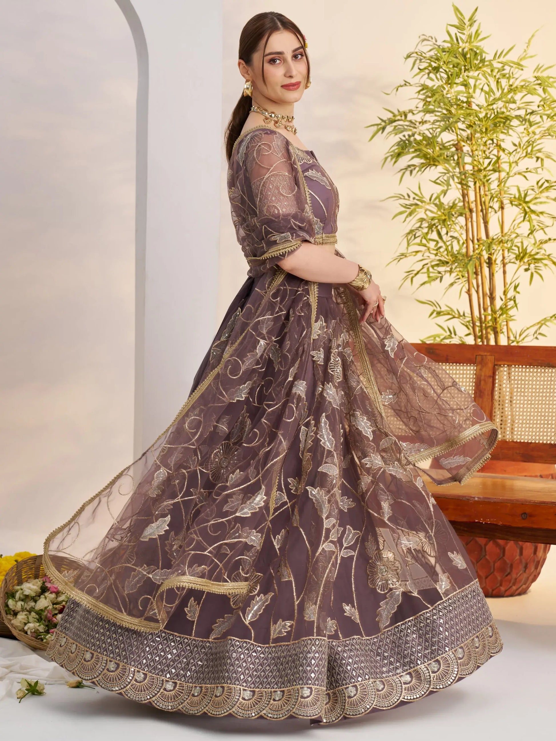 Attractive Mauve Thread Embroidery Net Reception Wear Lehenga With Blouse