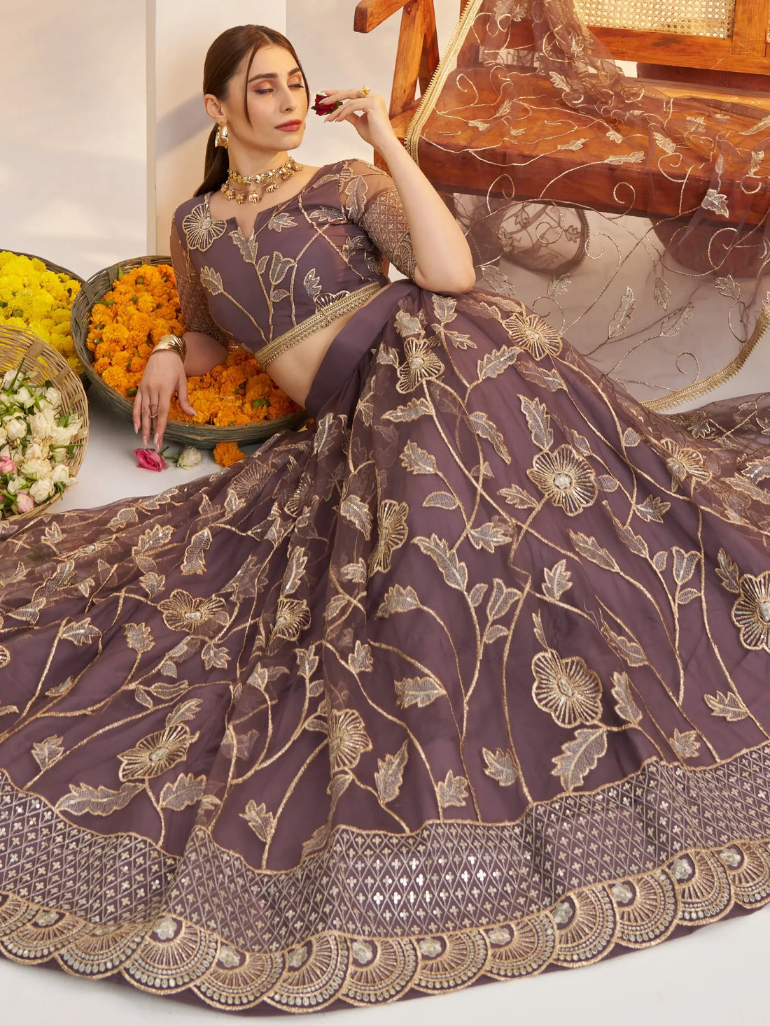 Attractive Mauve Thread Embroidery Net Reception Wear Lehenga With Blouse