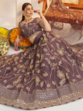 Attractive Mauve Thread Embroidery Net Reception Wear Lehenga With Blouse