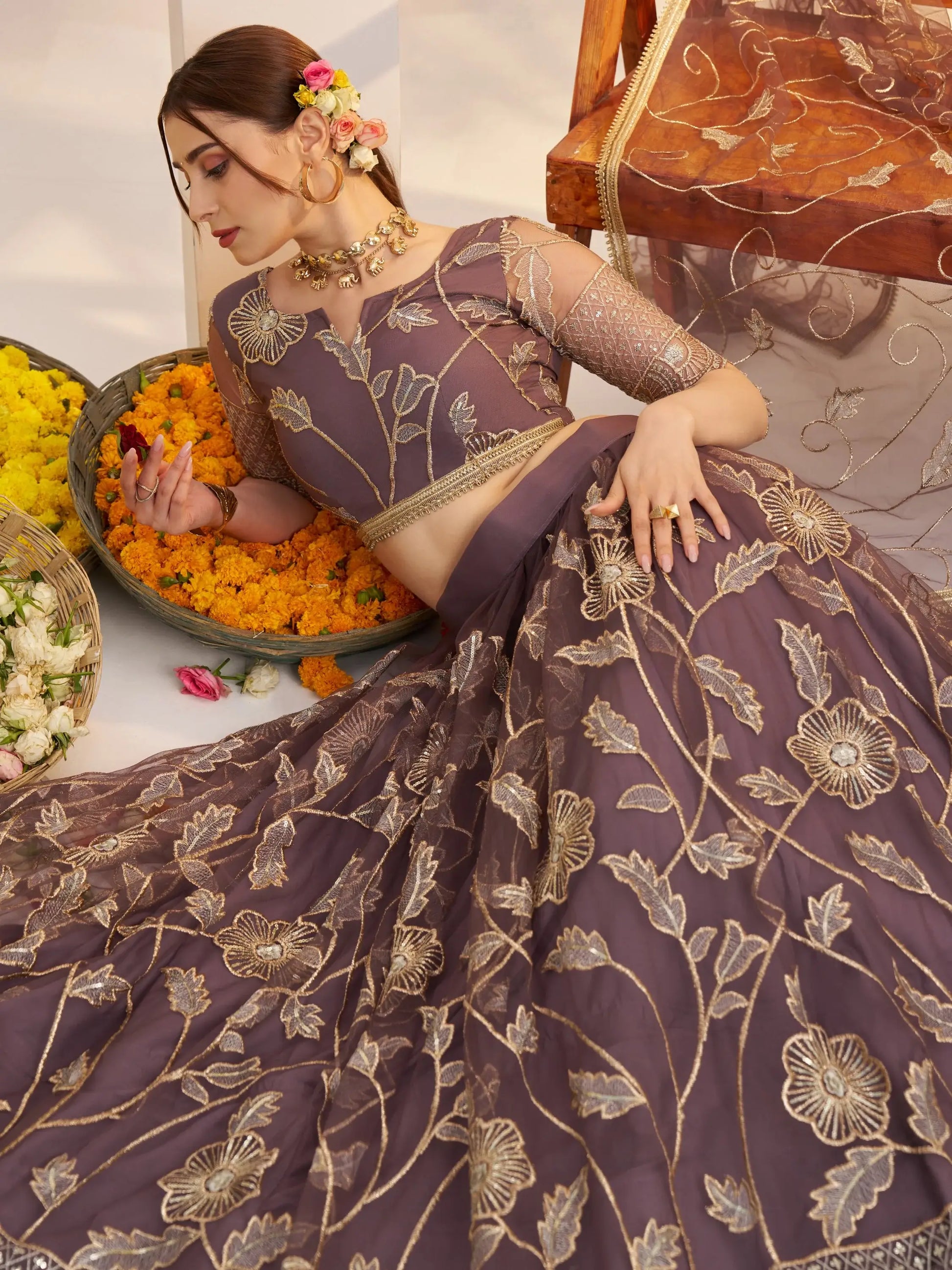 Attractive Mauve Thread Embroidery Net Reception Wear Lehenga With Blouse