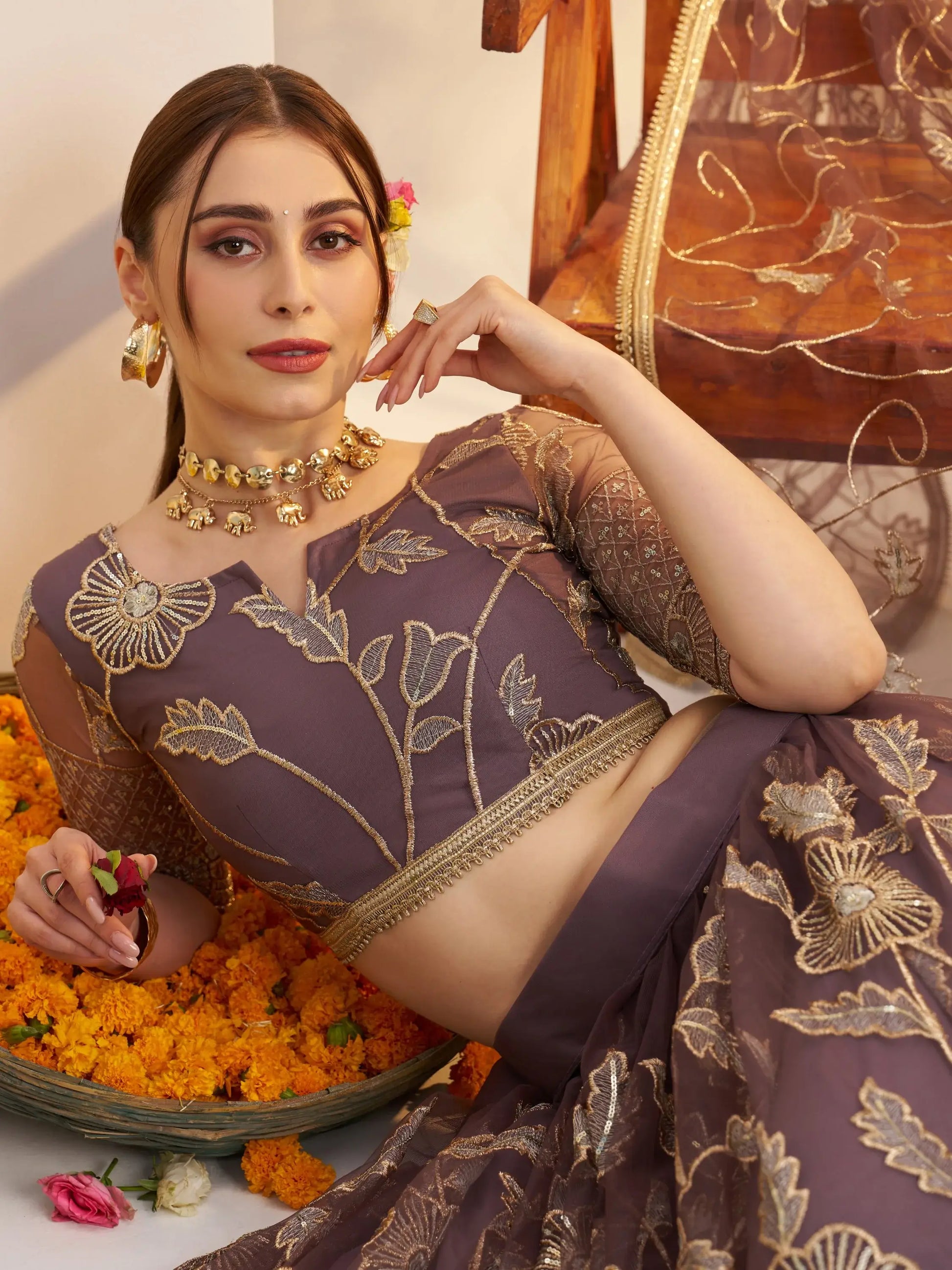 Attractive Mauve Thread Embroidery Net Reception Wear Lehenga With Blouse
