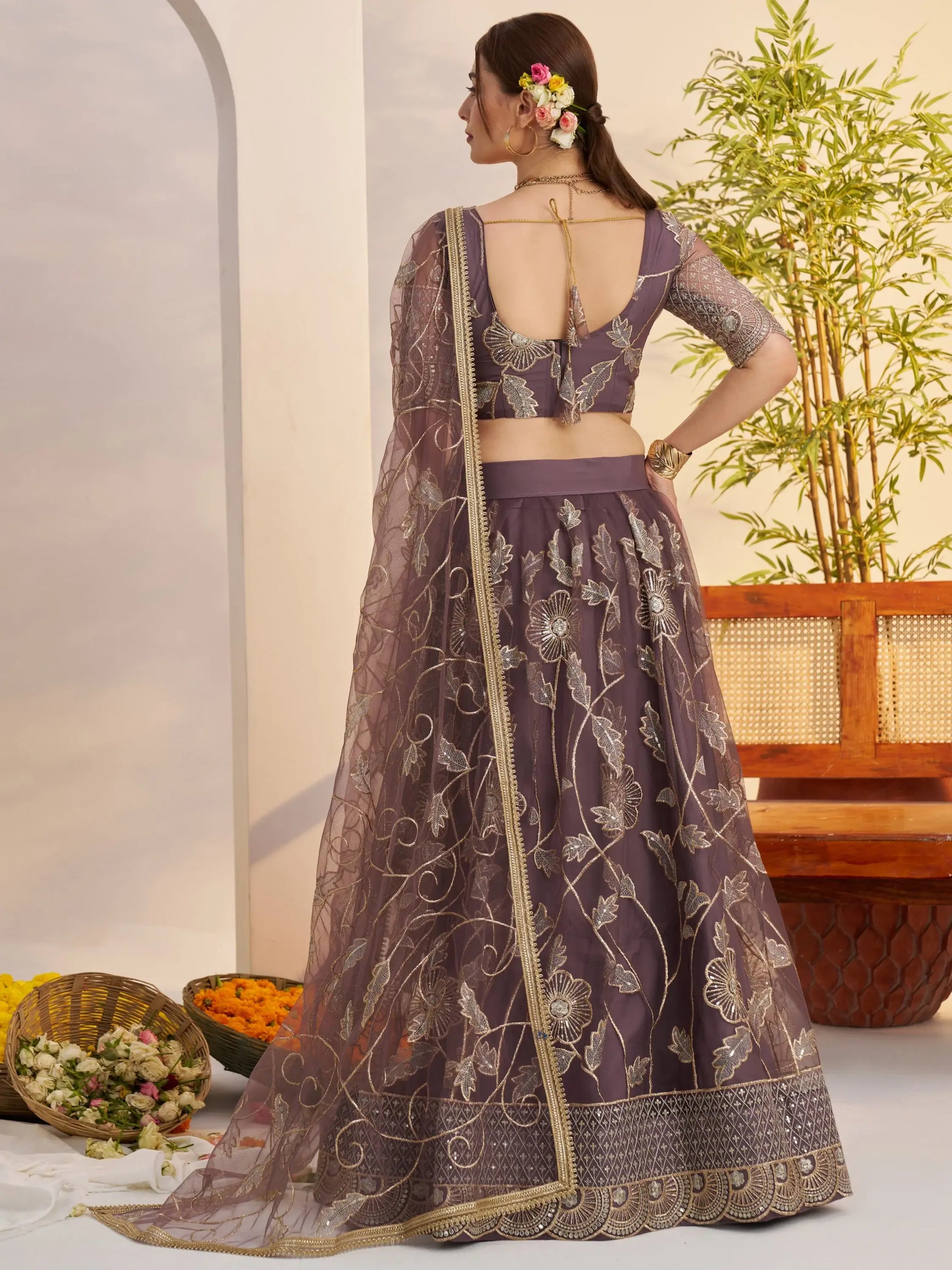 Attractive Mauve Thread Embroidery Net Reception Wear Lehenga With Blouse