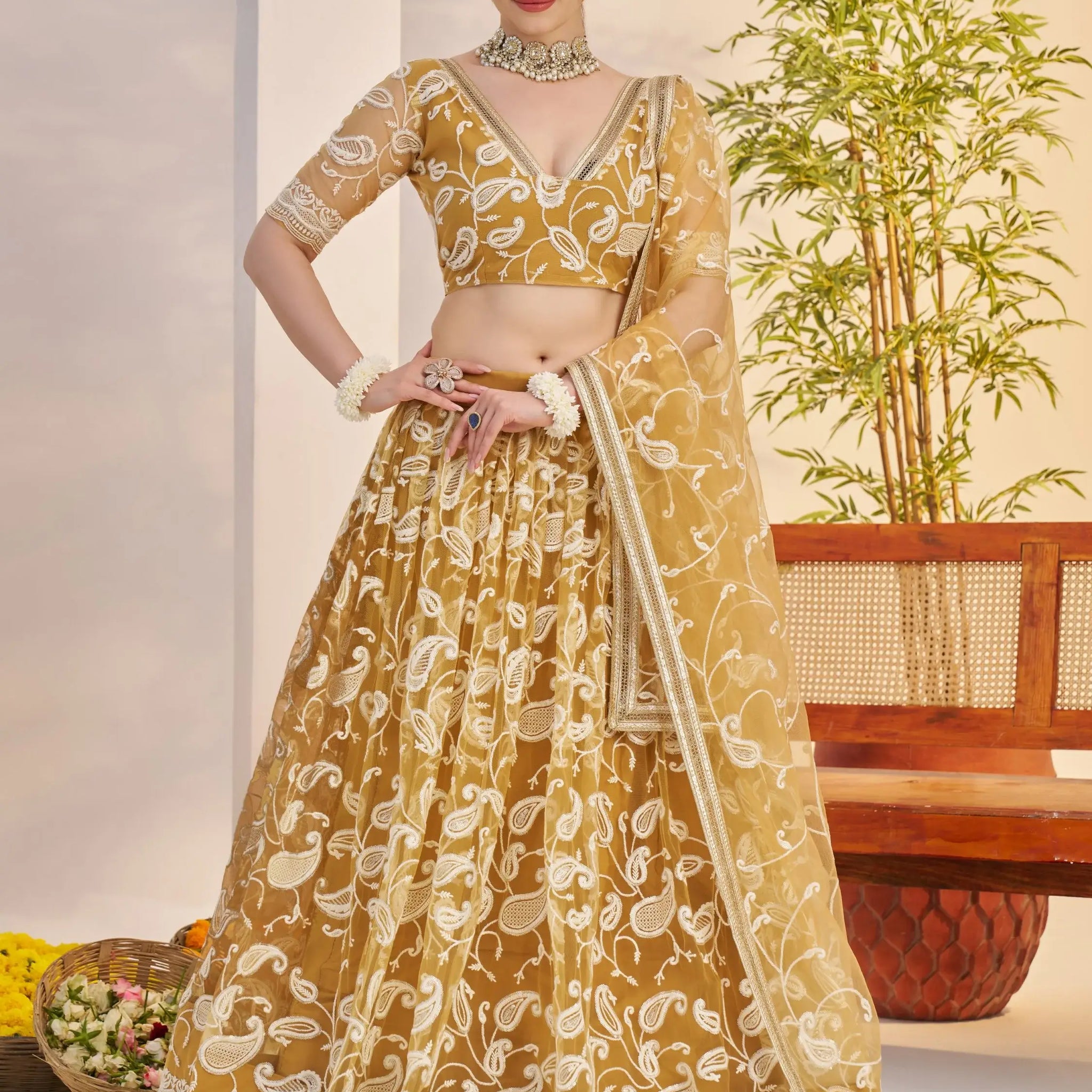 Charming Yellow Embroidered Net Haldi Wear Lehenga Choli With Dupatta