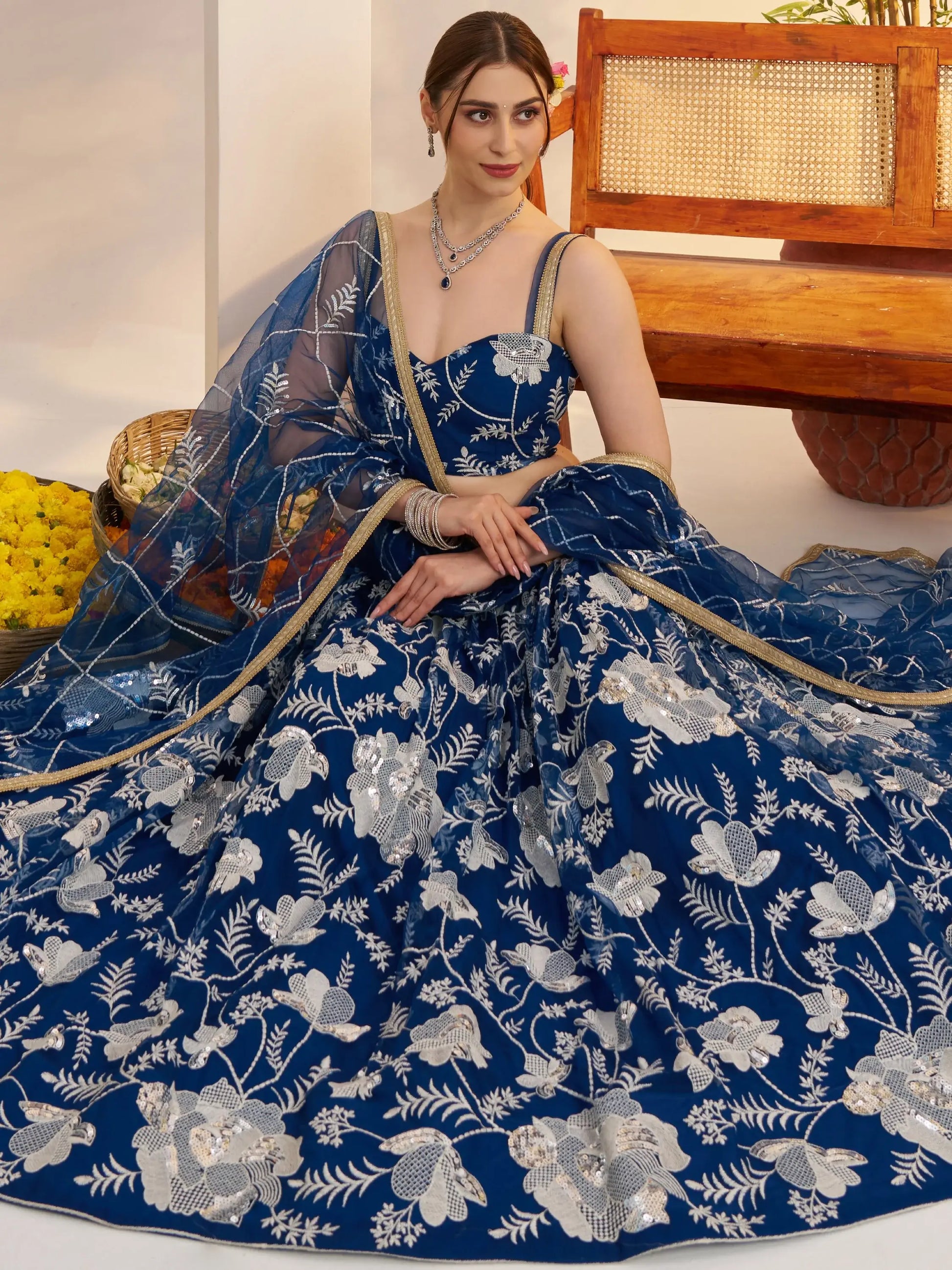 Adoring Teal Blue Floral Embroidery Net Engagement Wear Lehenga Choli