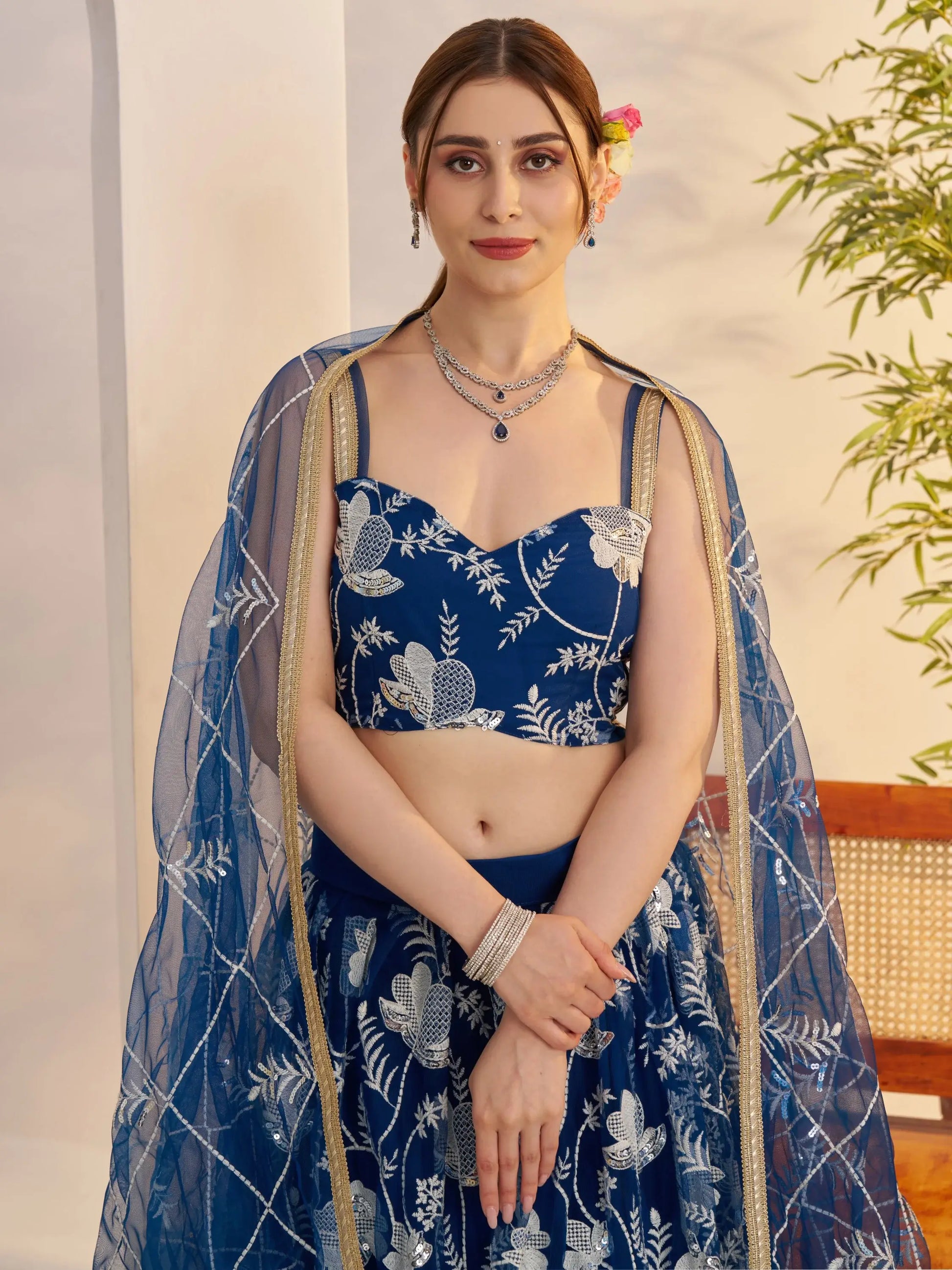 Adoring Teal Blue Floral Embroidery Net Engagement Wear Lehenga Choli