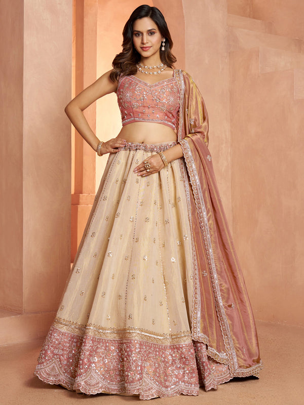 Impressive Peach Sequins Tissue Wedding Wear Lehenga Choli With Dupatta