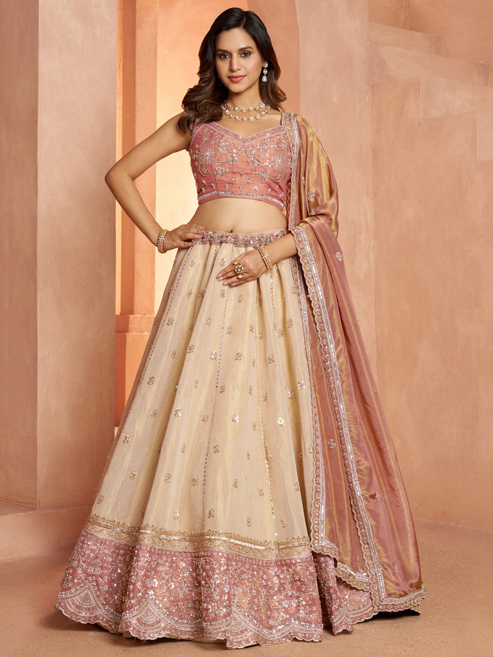 Impressive Peach Sequins Tissue Wedding Wear Lehenga Choli With Dupatta