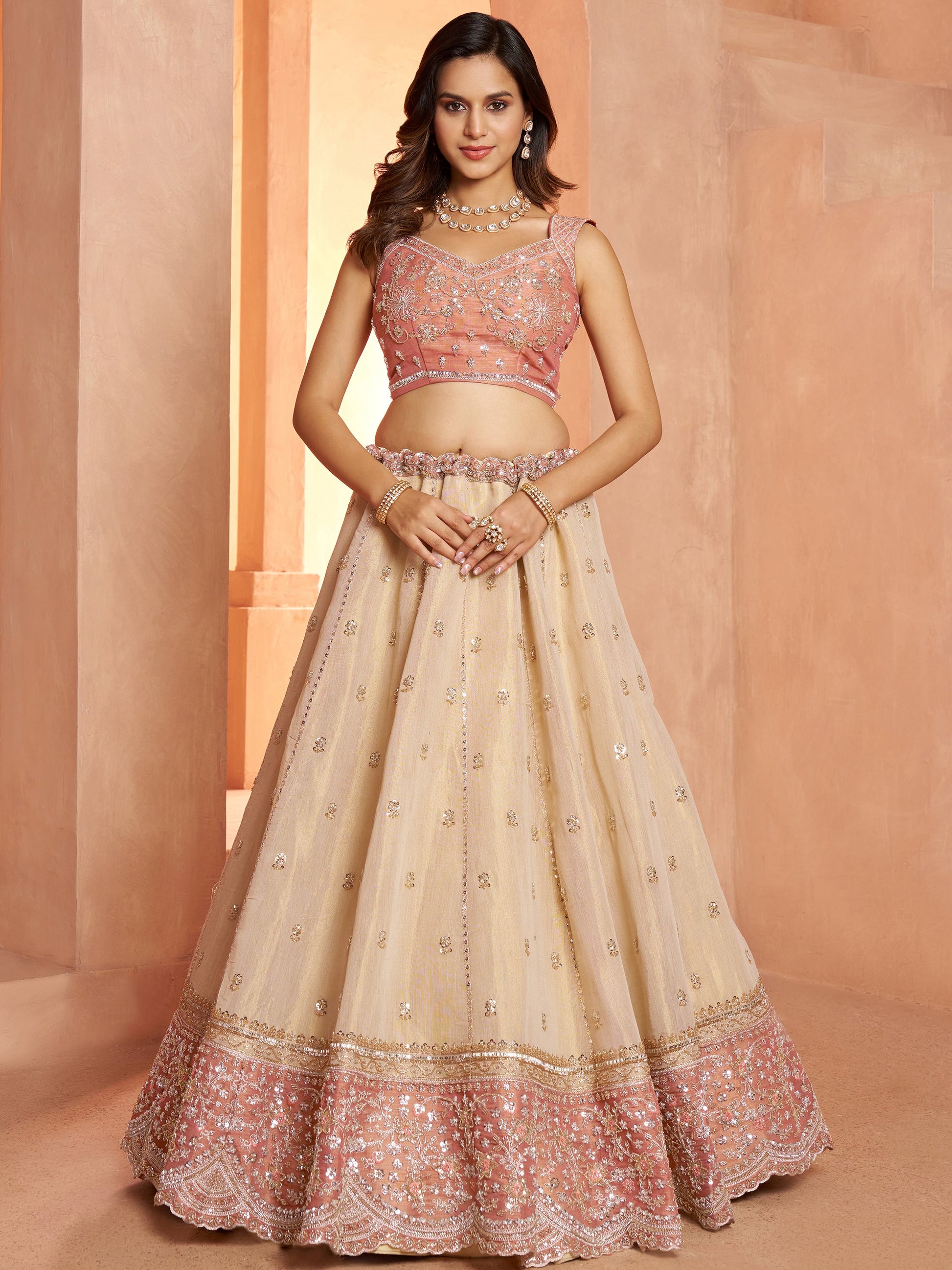Impressive Peach Sequins Tissue Wedding Wear Lehenga Choli With Dupatta