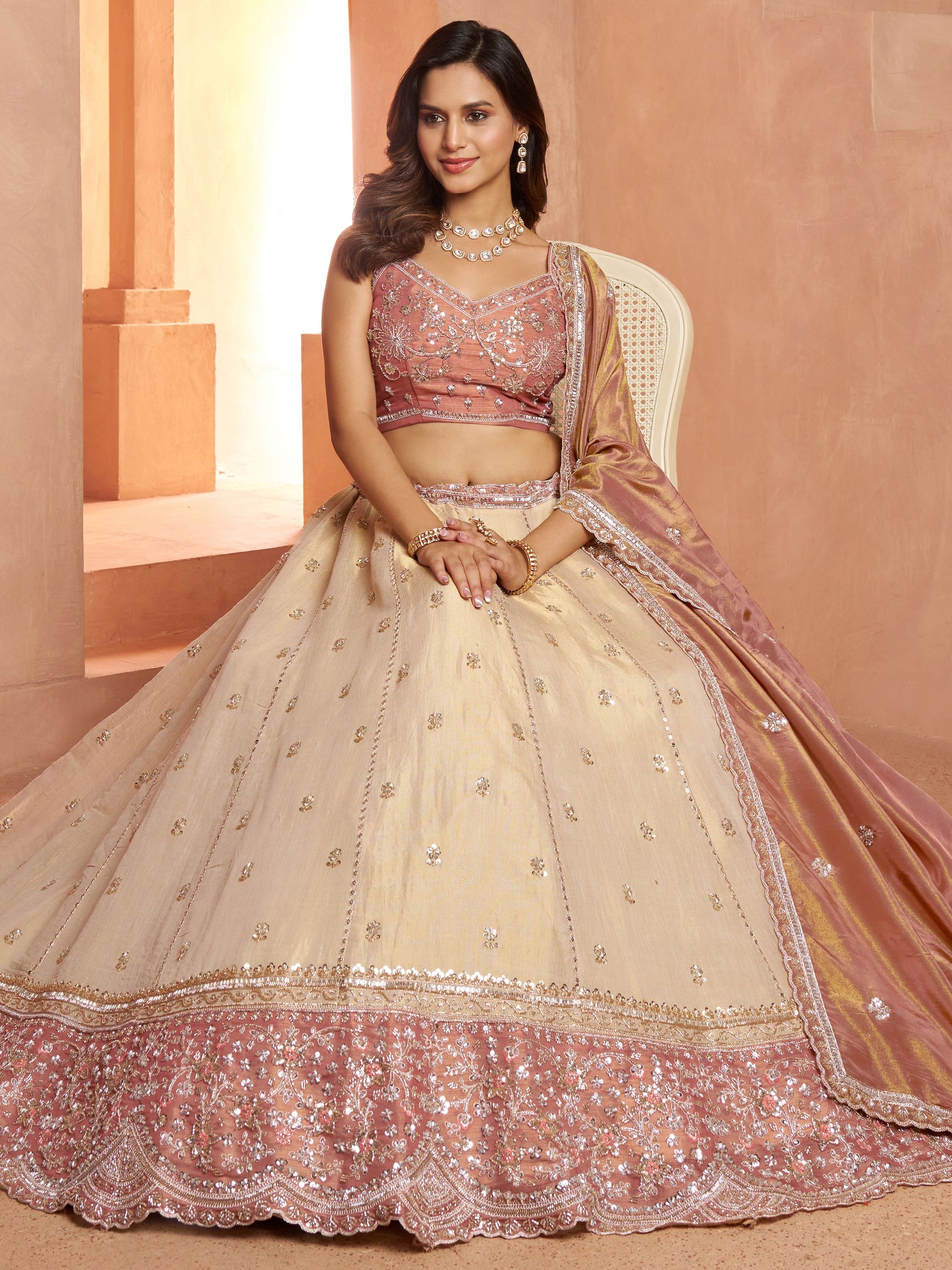 Impressive Peach Sequins Tissue Wedding Wear Lehenga Choli With Dupatta