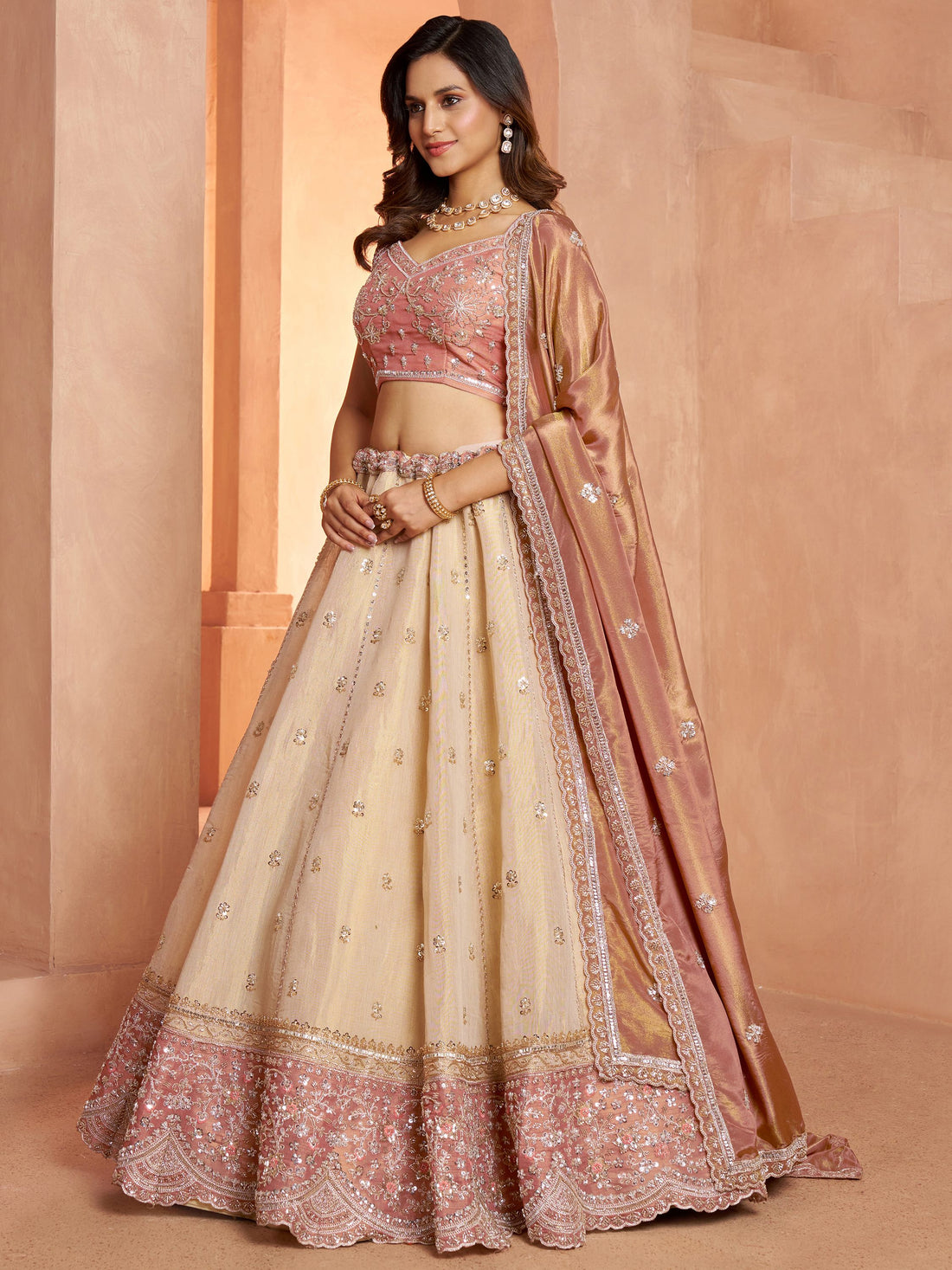 Impressive Peach Sequins Tissue Wedding Wear Lehenga Choli With Dupatta