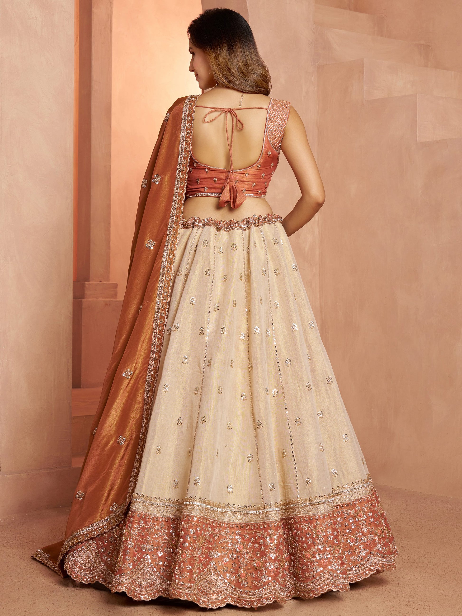 Stylish Rust Beads Work Tissue Wedding Wear Lehenga Choli With Dupatta
