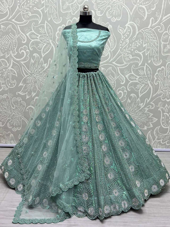 Beautiful Sea Green Sequins Net Reception Wear Lehenga Choli
