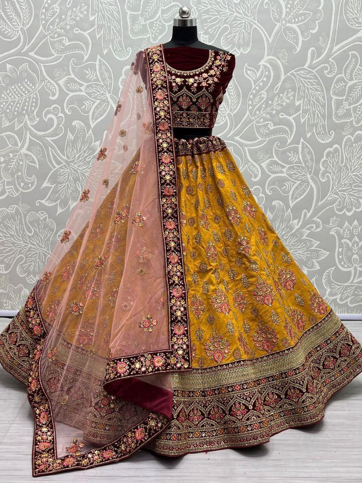 Graceful Yellow Thread Work Silk Reception Wear Lehenga Choli