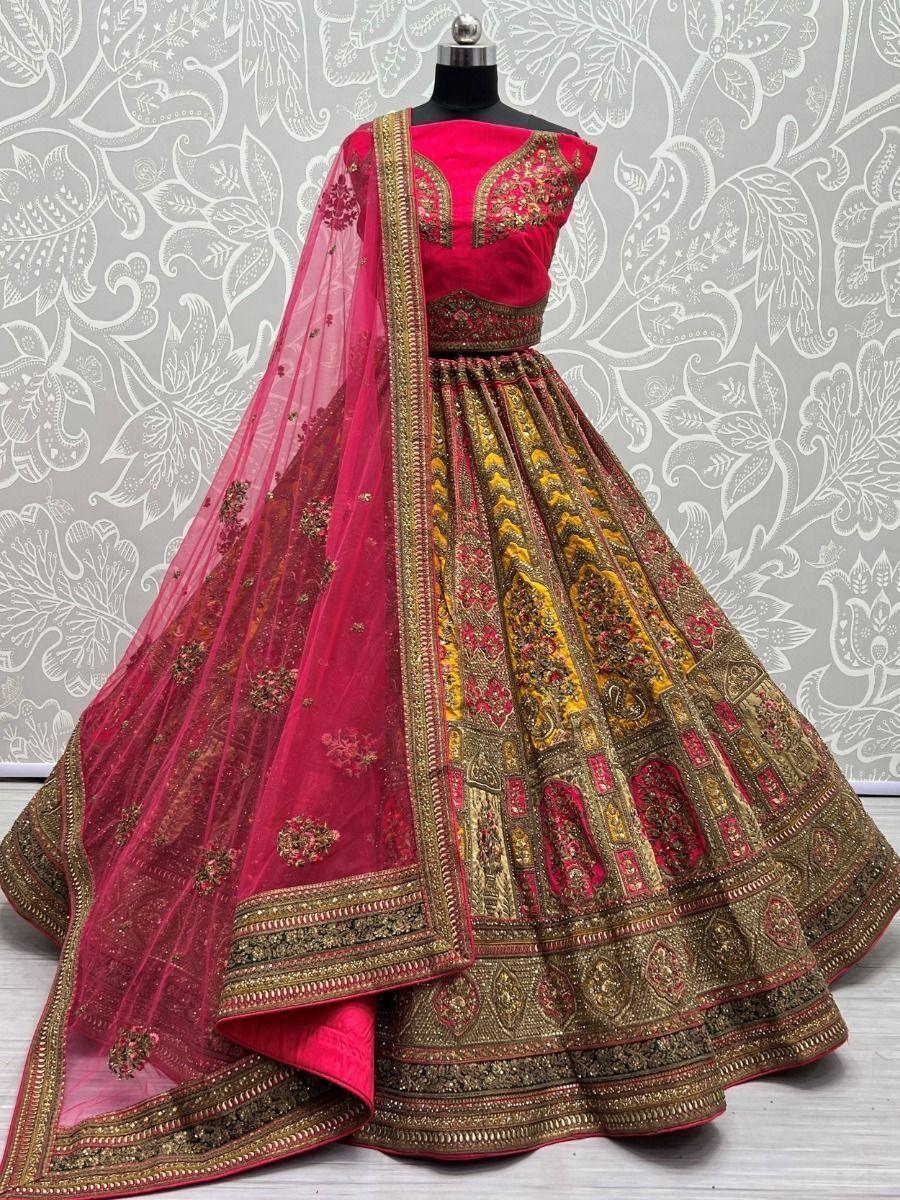 Adorable Yellow And Pink Embroidered Velvet Bridal Wear Lehenga Choli
