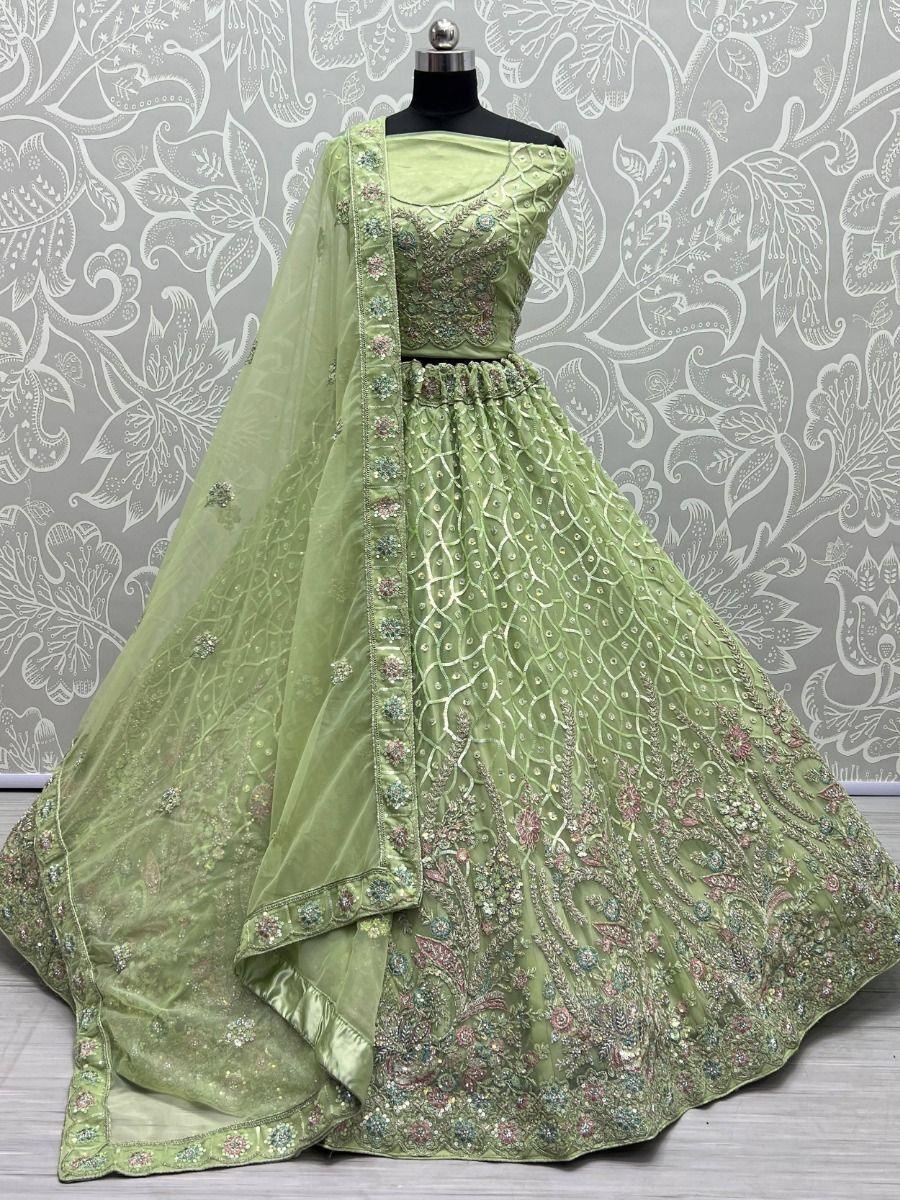 Fascinating Sea Green Sequins Net Engagement Wear Lehenga Choli