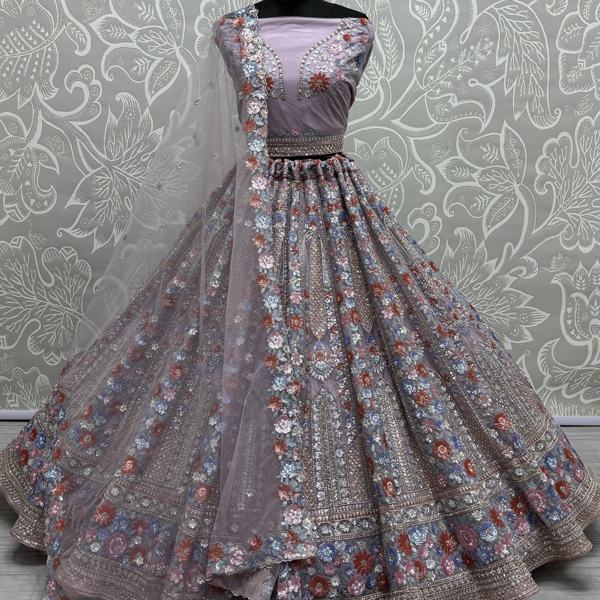 Awesome Lavender Sequins Net Engagement Wear Lehenga Choli