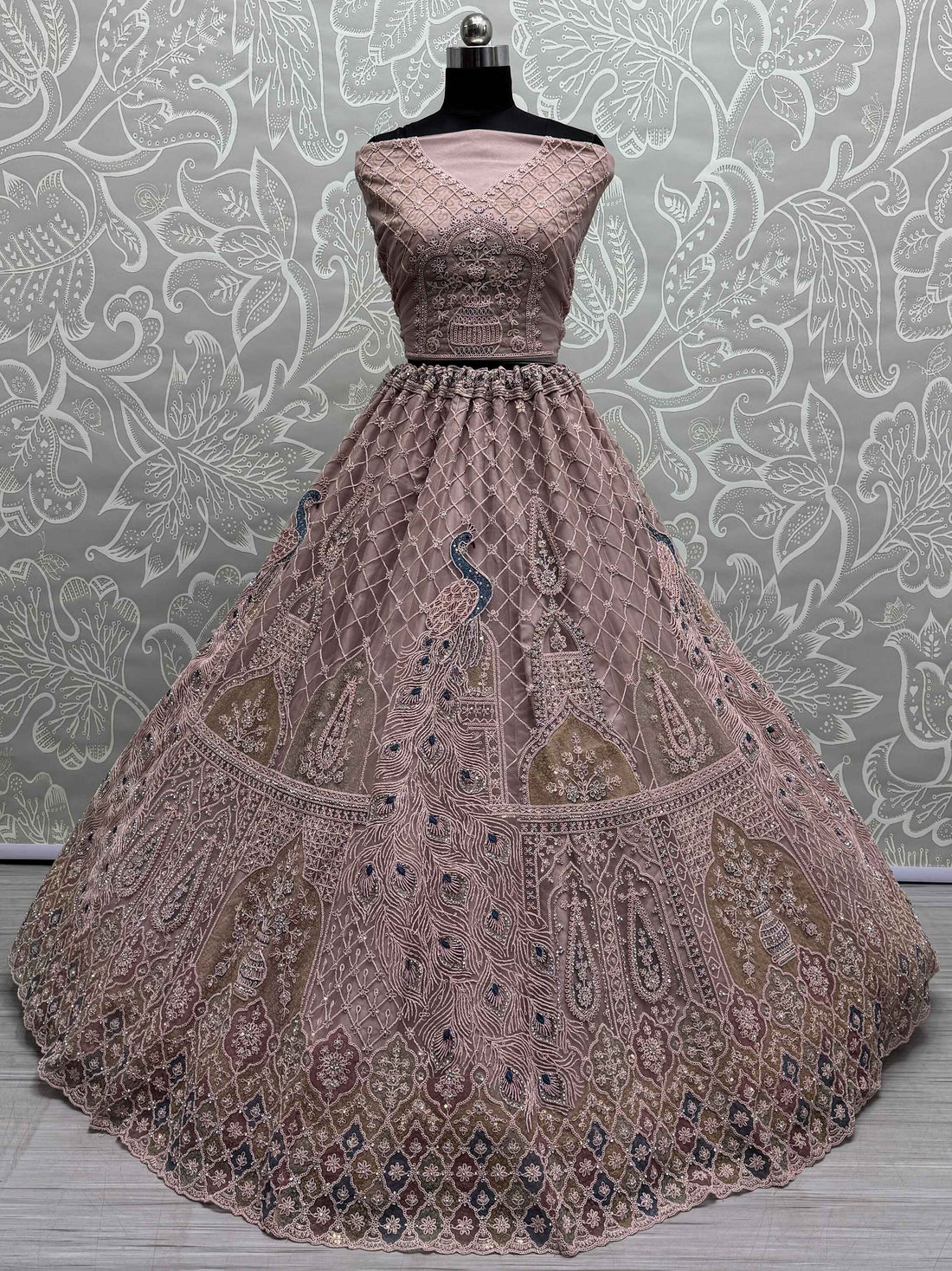 Beautiful Peach Sequins Net Engagement Wear Lehenga Choli