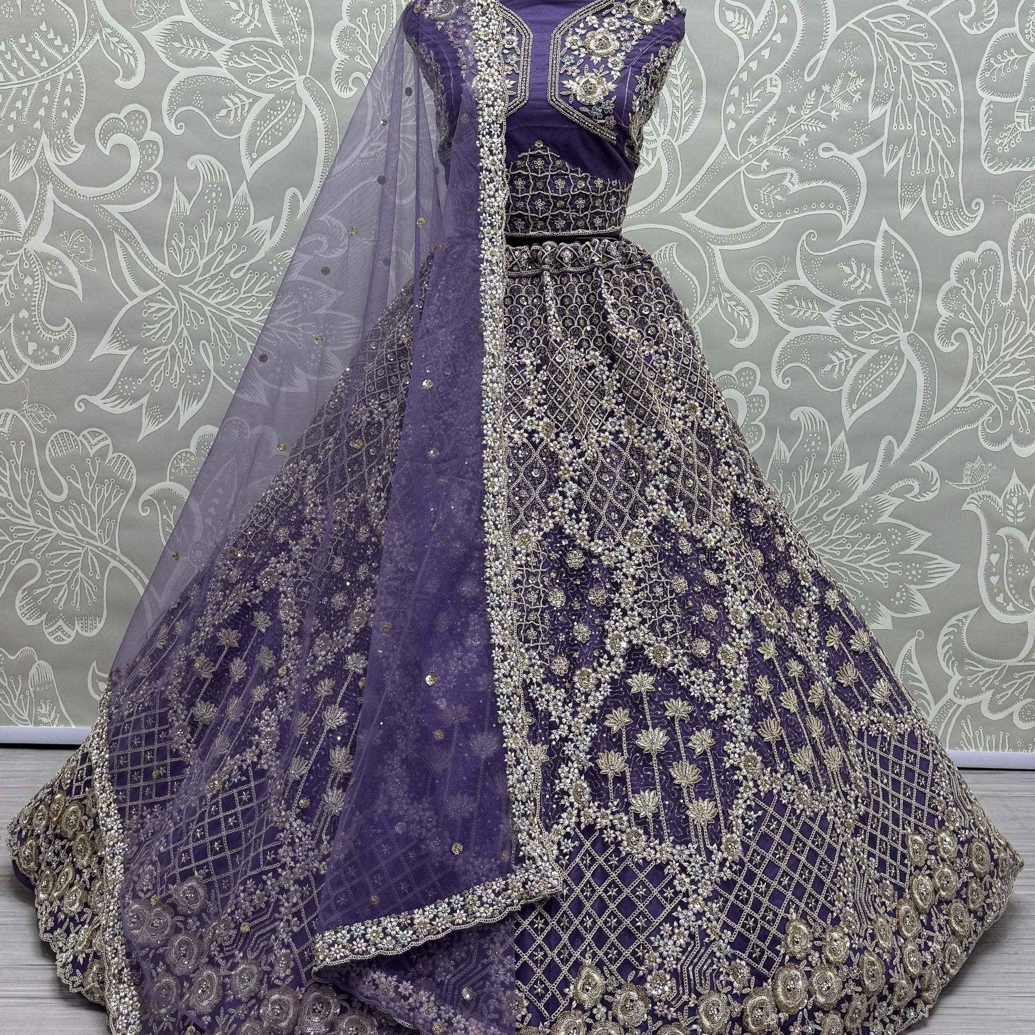 Alluring Purple Thread Embroidery Net Wedding Lehenga Choli
