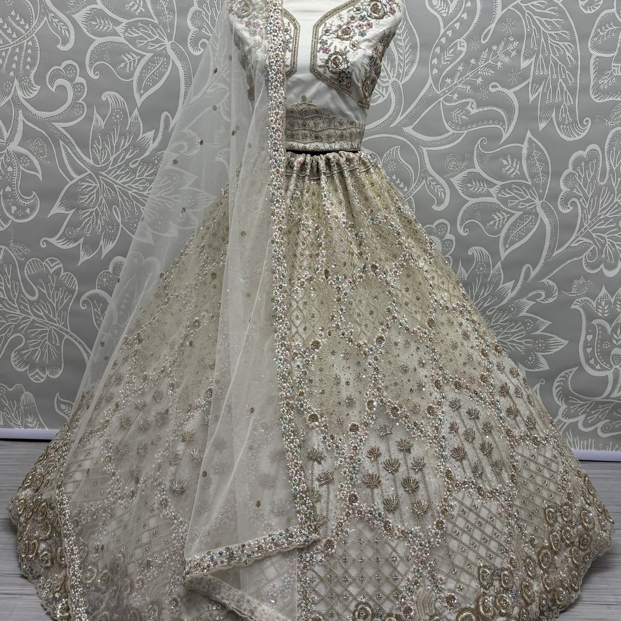Wonderful Off-White Zirkon Work Net Bridesmaid Lehenga Choli With Dupatta 